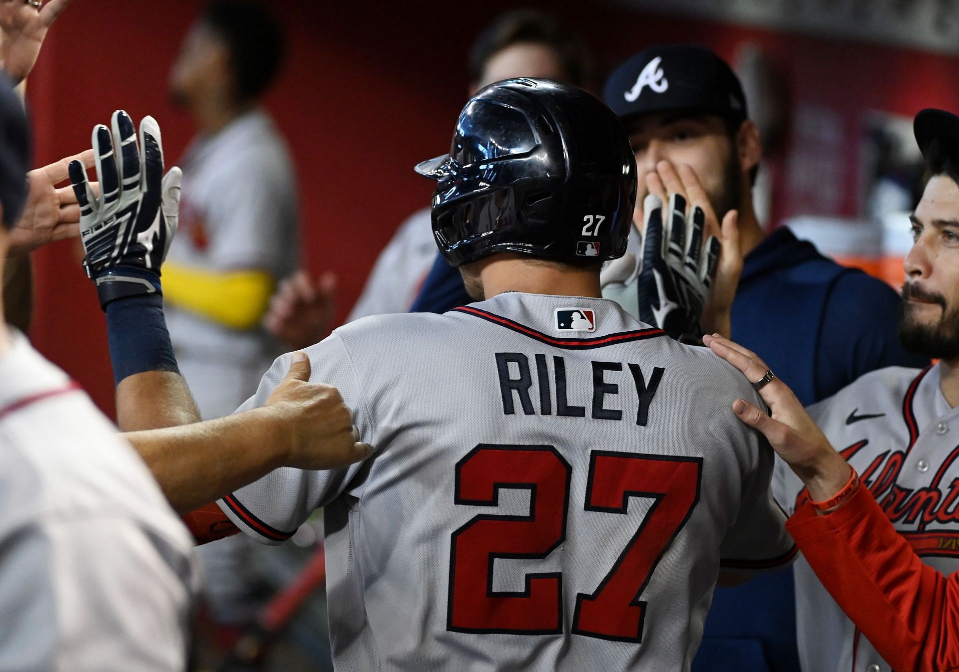 Third Baseman Austin Riley celebrates with teammates after a home run during a Atlanta Braves v Arizona Diamondbacks game.