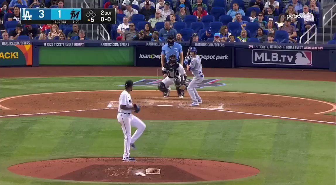 Trea Turner gets hit in the helmet by a pitch from Edward Cabrera