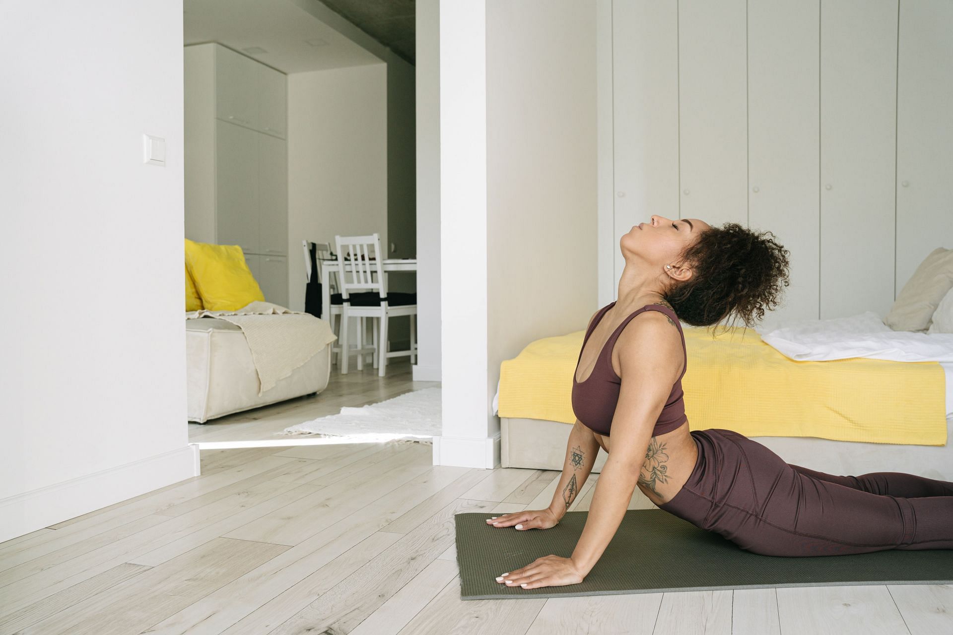 Incorporating regular yoga practice can help relief neck and shoulder pain. (Image via Pexels / Ivan Samkov)