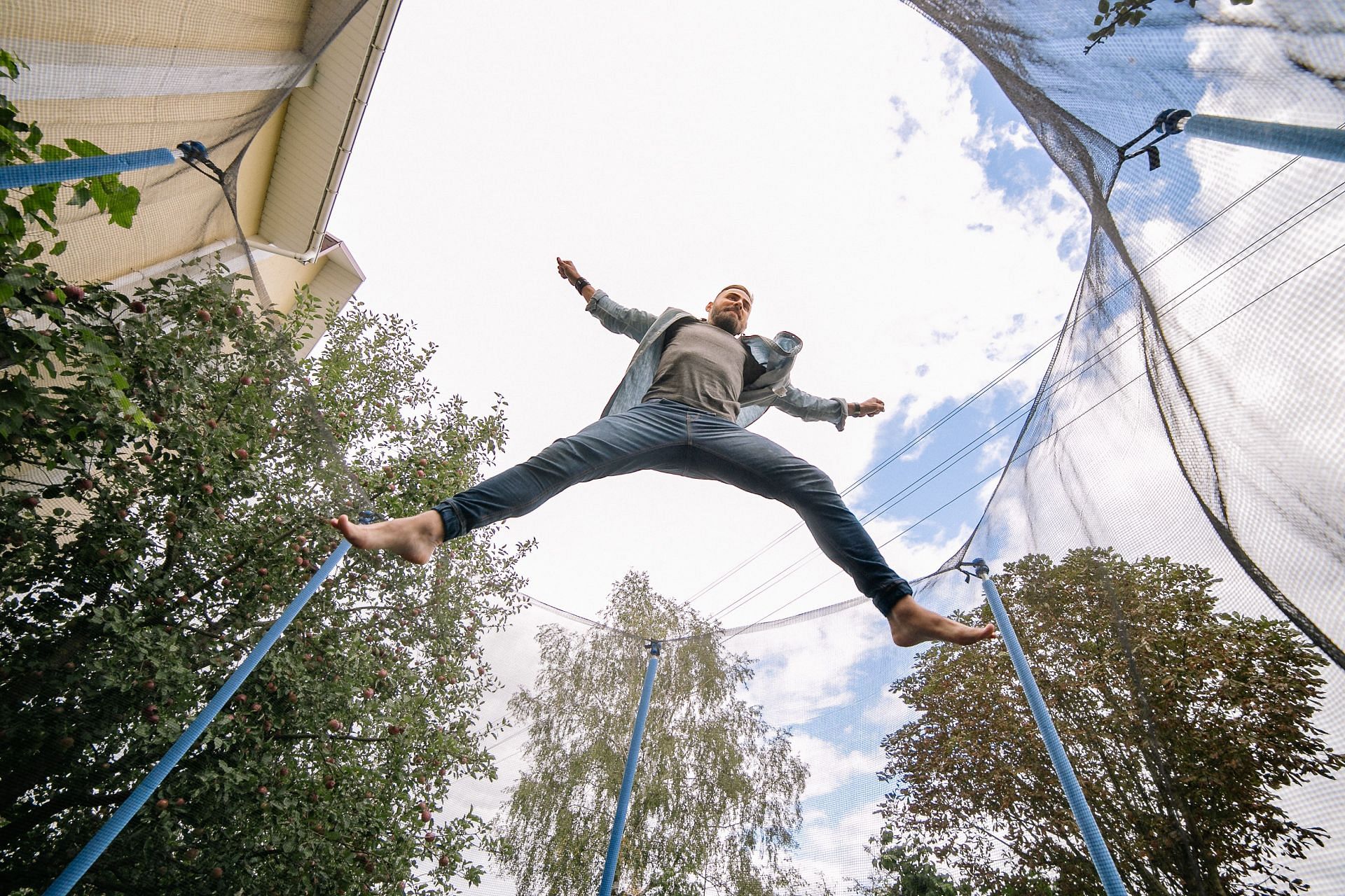 Trampoline exercises can be a fun diversion from your typical workout regimen. (Image via Pexels/ Yan Krukov)
