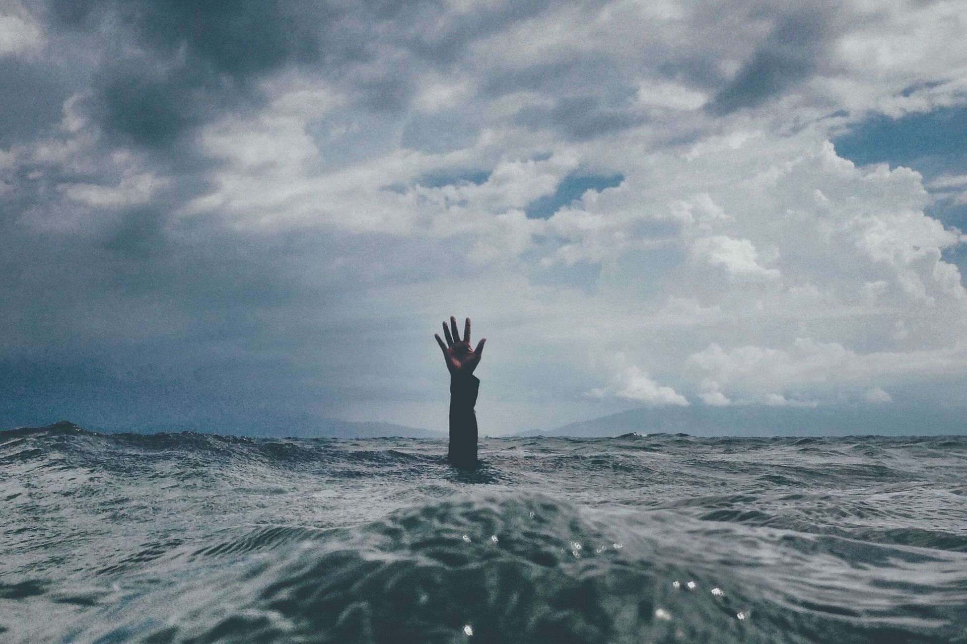 A depressive episode can feel like drowning, but rescue is possible. (Photo via Unsplash/ Nikko Macaspac)