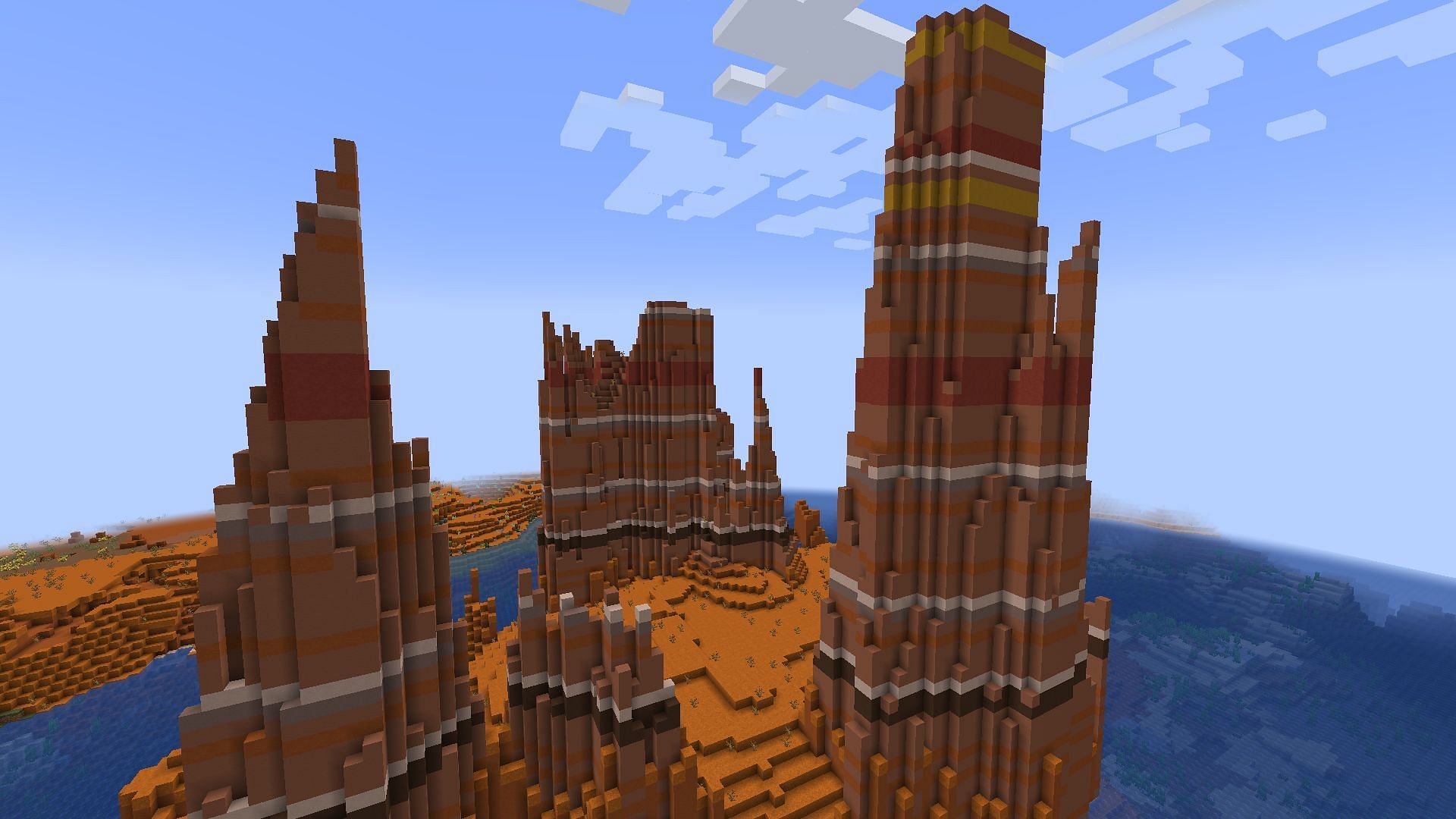 A red rock valley, one of the new biomes added in the Oh The Biomes You&#039;ll Go mod (Image via Minecraft)