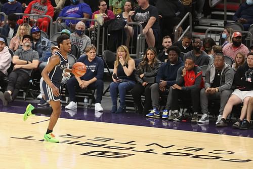 Bronny James brings the ball up the court