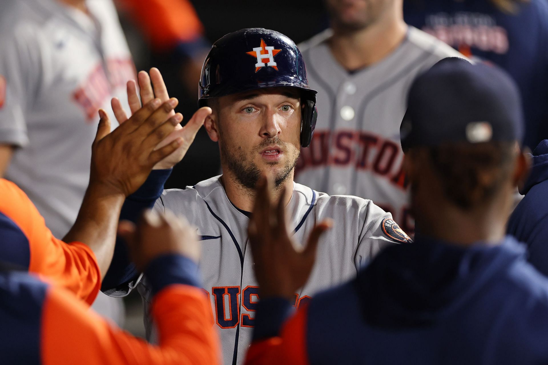 Alex Bregman celebrates with teammates in the dugout after scoring a run during last night&#039;s Houston Astros v Chicago White Sox game in Chicago, Illinois.