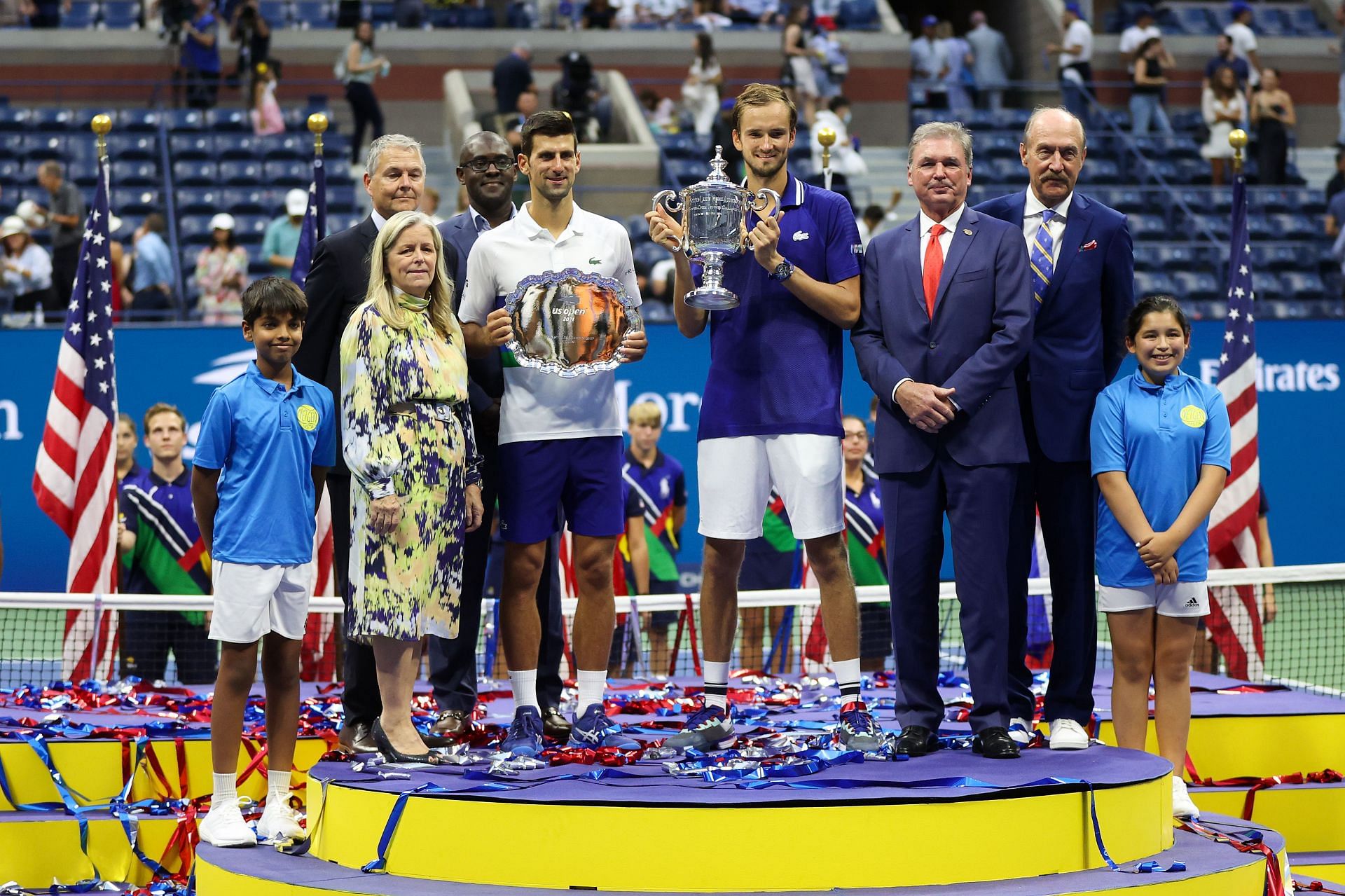 Tournament director Stacey Allaster [right of Novak Djokovic] at the 2021 US Open presentation ceremony.