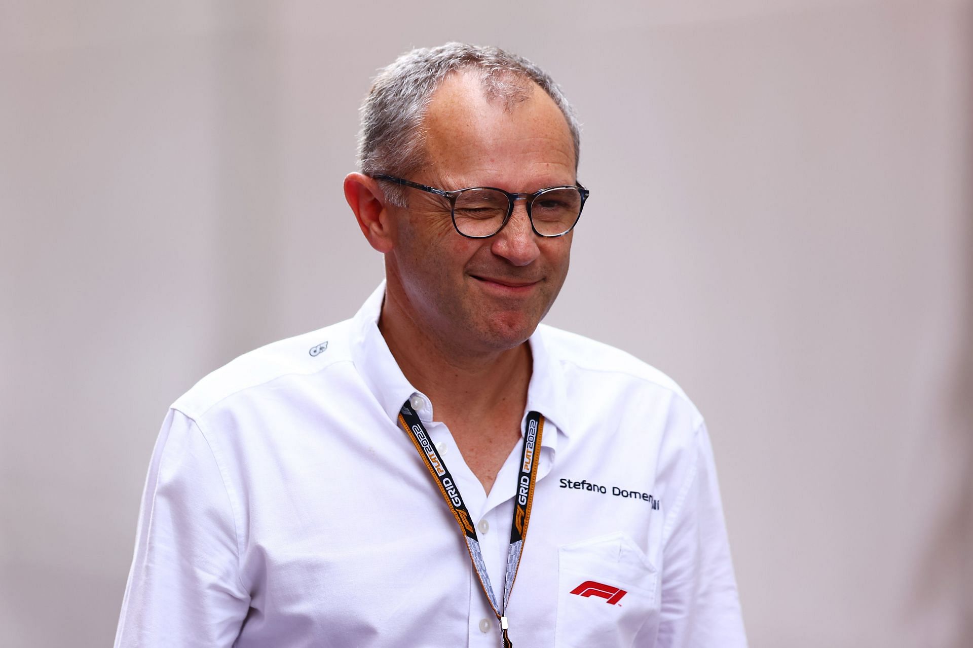 F1 CEO Stefano Domenicali winks for the cameras during the 2022 F1 Monaco GP weekend (Photo by Eric Alonso/Getty Images)