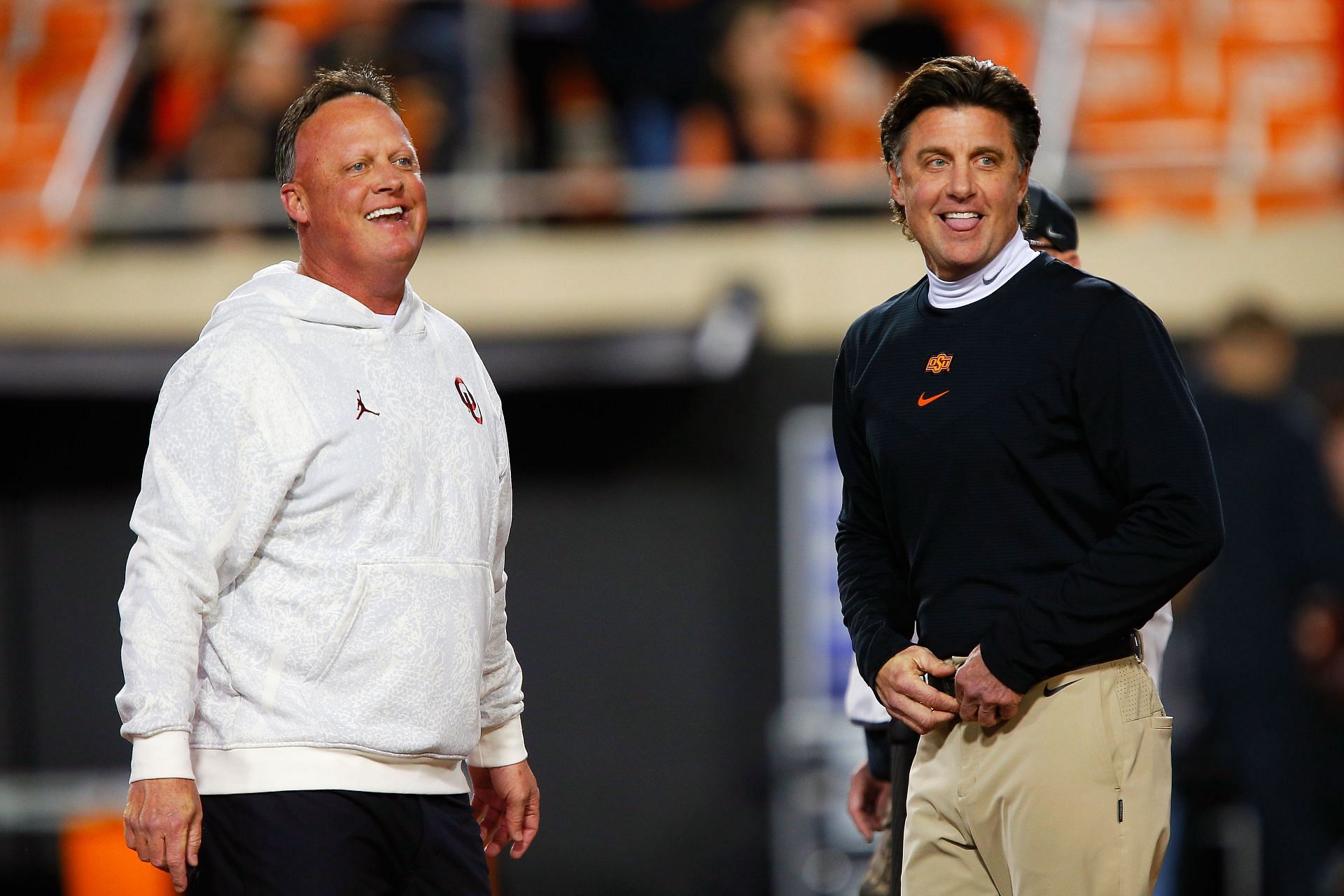 Cale Gundy (left) with his brother during an Oklahoma v Oklahoma State game