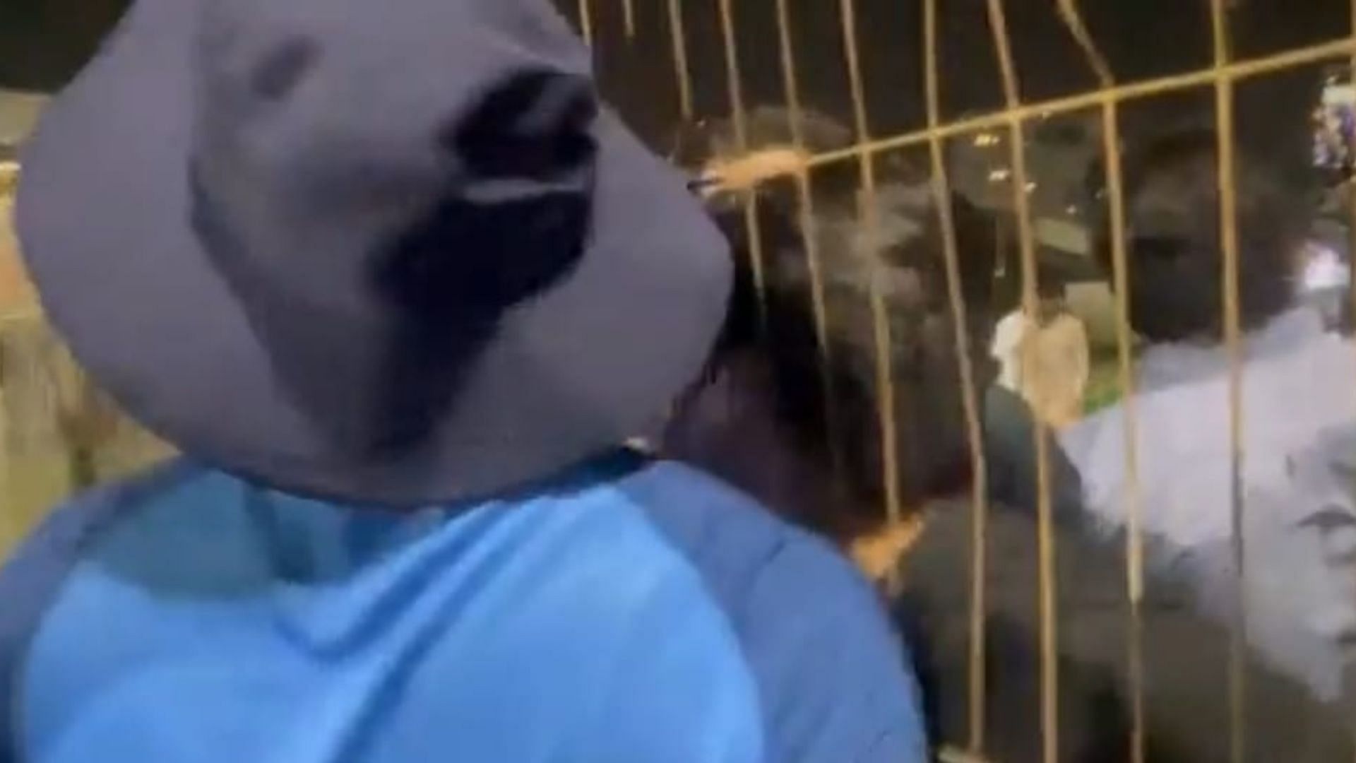Snippet of a video on Twitter where Rohit Sharma hugs his fan from Pakistan