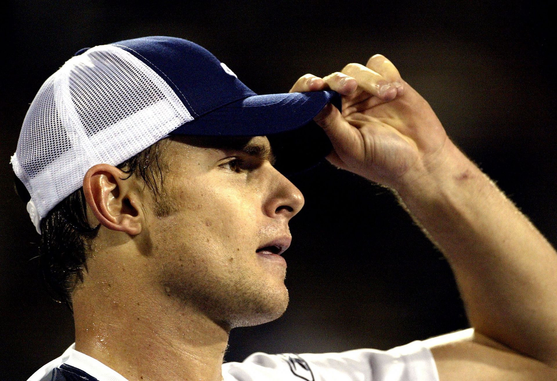 Andy Roddick looks on during a match