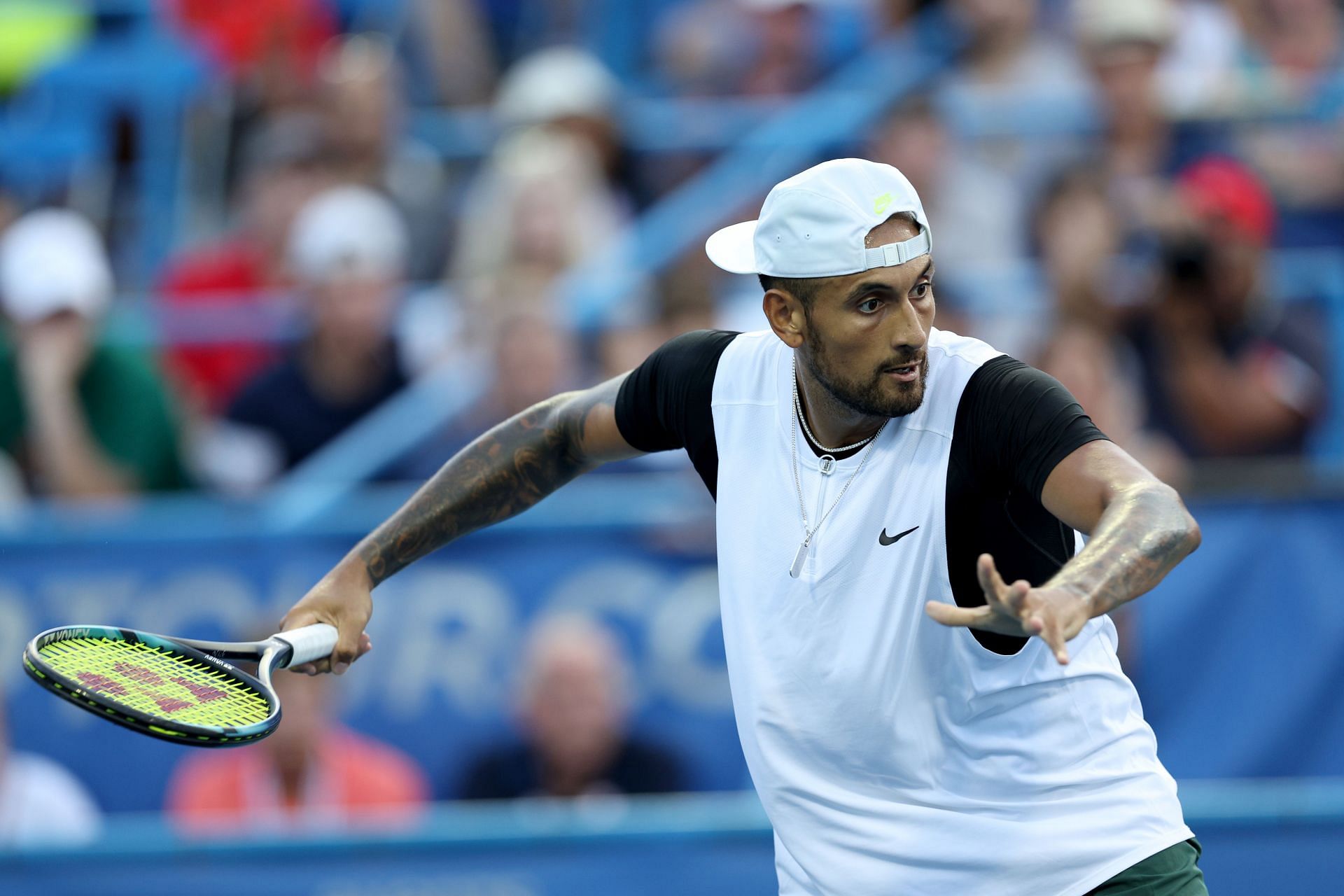 Nick Kyrgios prepares to take a forehand against Marcos Giron in their first round match in Washington