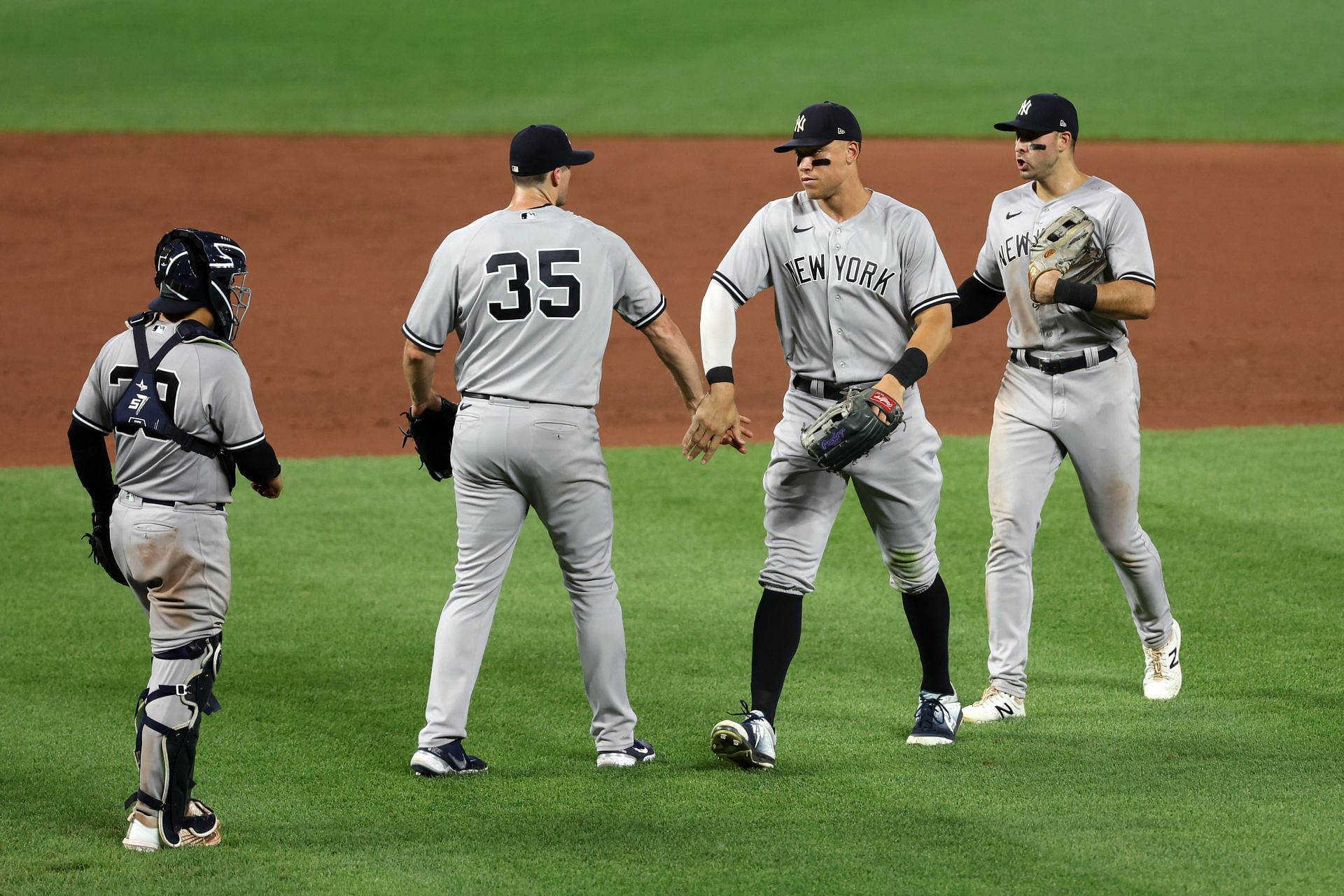 Yankees players celebrate after a New York Yankees v Baltimore Orioles game.