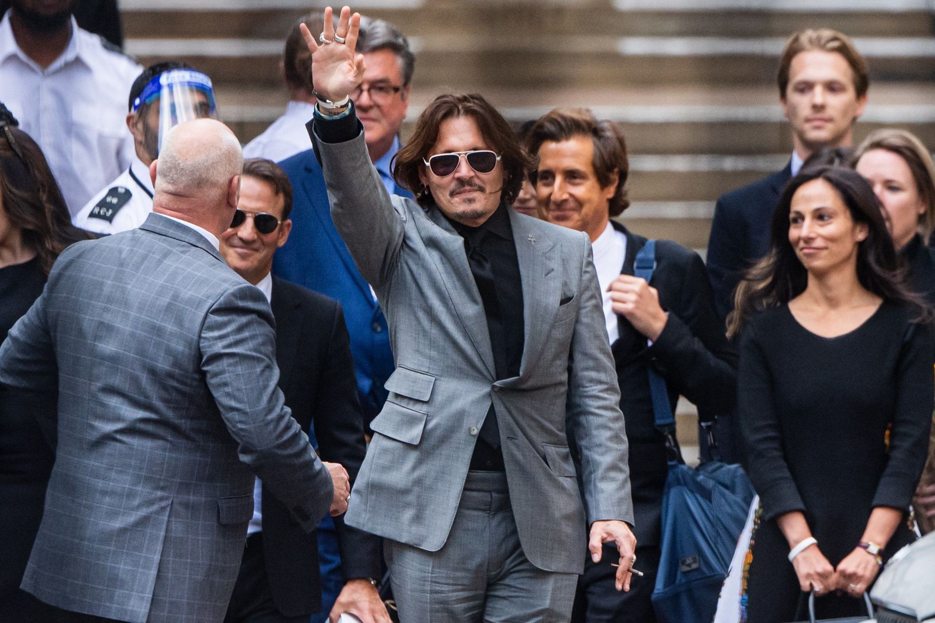 CUNY removes article praising attorney who worked with Johnny Depp (Image via Getty Images)