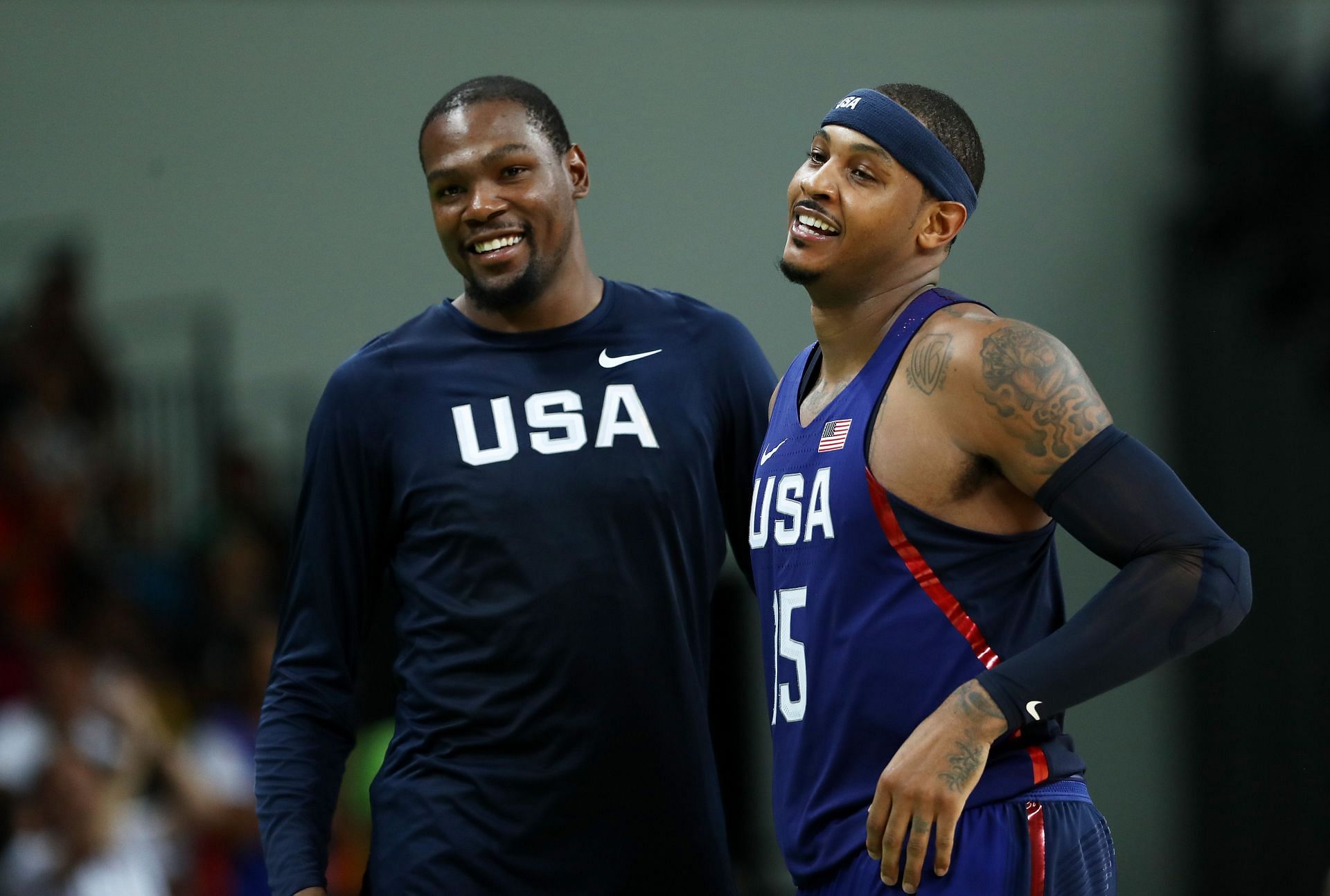 Kevin Durant, left, and Carmelo Anthony of the United States celebrate after defeating Serbia during the men&#039;s gold medal game at the 2016 Olympic Games on Aug. 21, 2016, in Rio de Janeiro, Brazil.