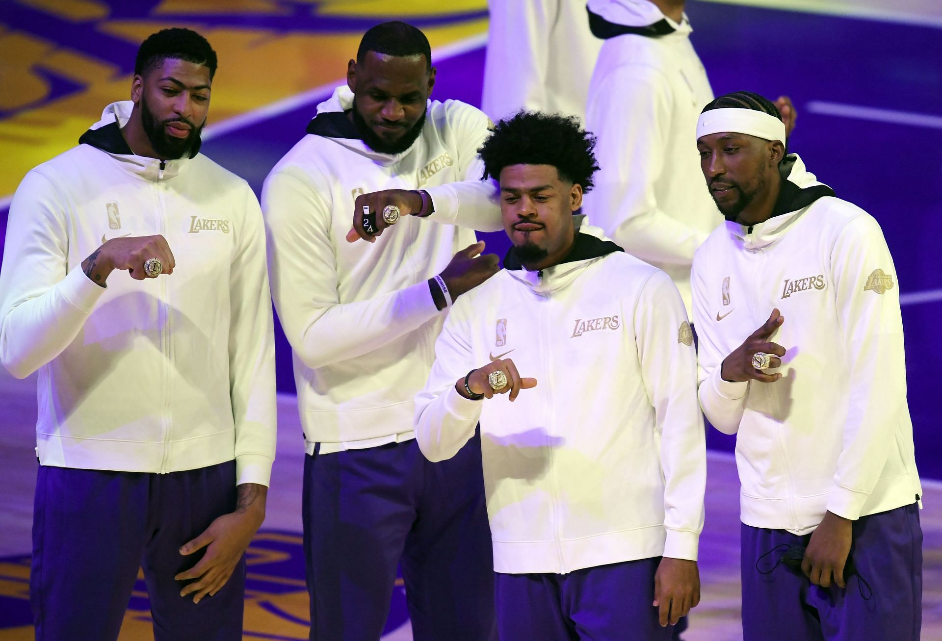 (L-R) Anthony Davis, LeBron James, Quinn Cook and Kentavious Caldwell-Pope of the Los Angeles Lakers pose during the 2020 NBA championship ring ceremony.