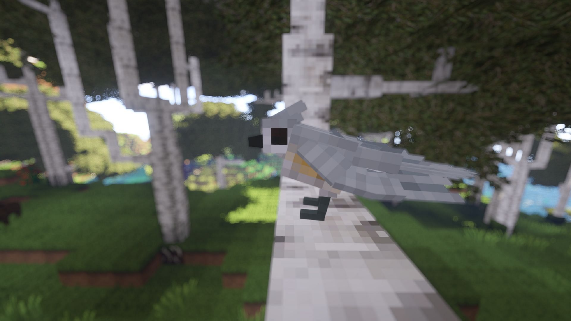 A songbird rests on a tree in Better Animals Plus (Image via cybercat5555/CurseForge)