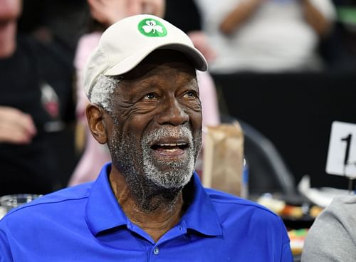 Bill Russell watching a WNBA game