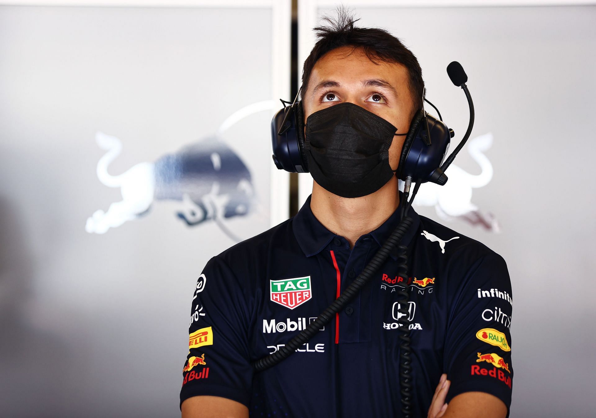 Alex Albon looks on from the paddock at the Circuit of the Americas during the 2021 F1 American GP as Red Bull&#039;s reserve driver (Photo by Mark Thompson/Getty Images)