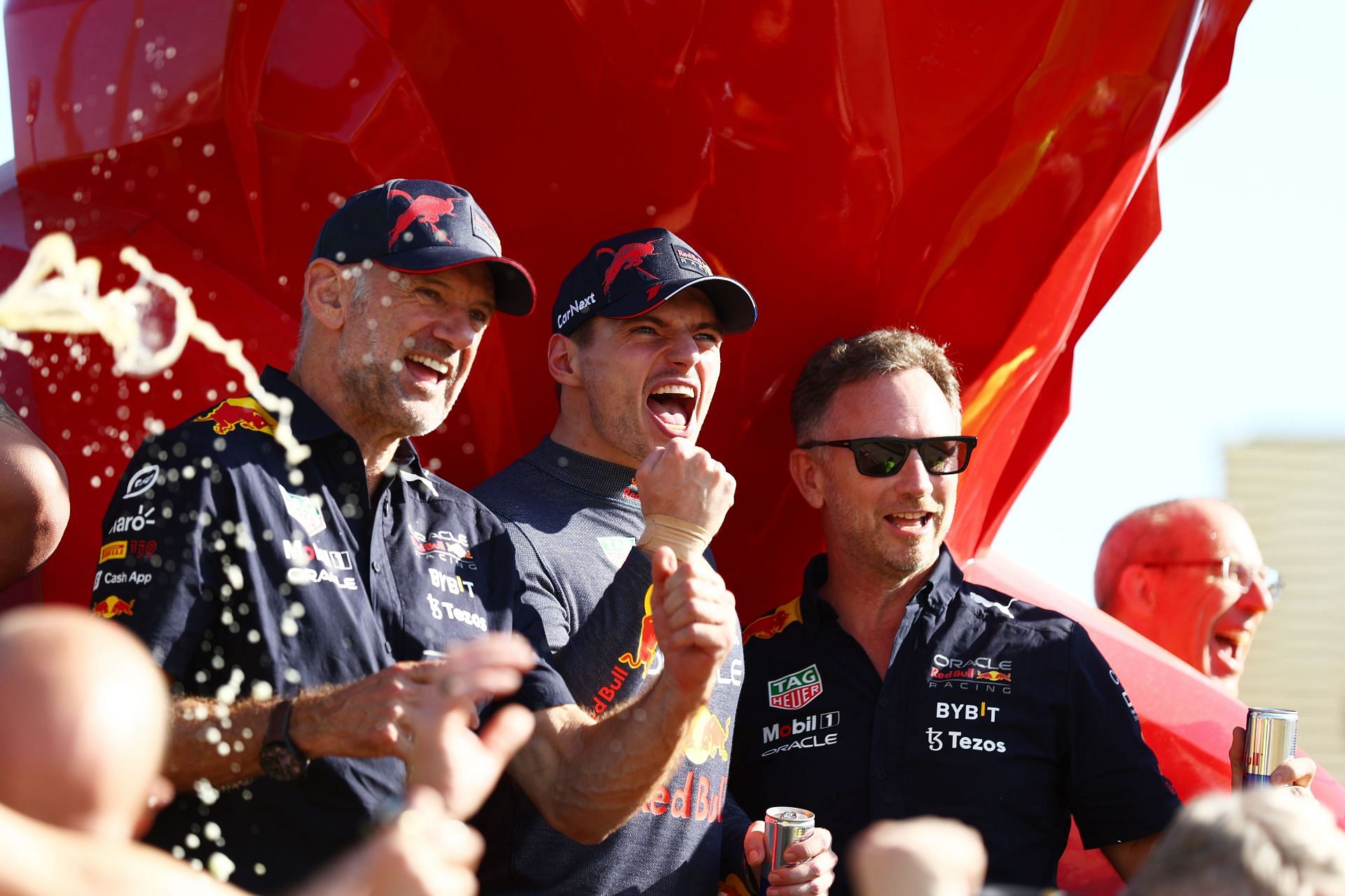 Max Verstappen (center) celebrates with Red Bull Racing team principal Christian Horner (right) and chief technical officer Adrian Newey (left) after the F1 Grand Prix of France at Circuit Paul Ricard on July 24, 2022, in Le Castellet, France (Photo by Clive Rose/Getty Images)