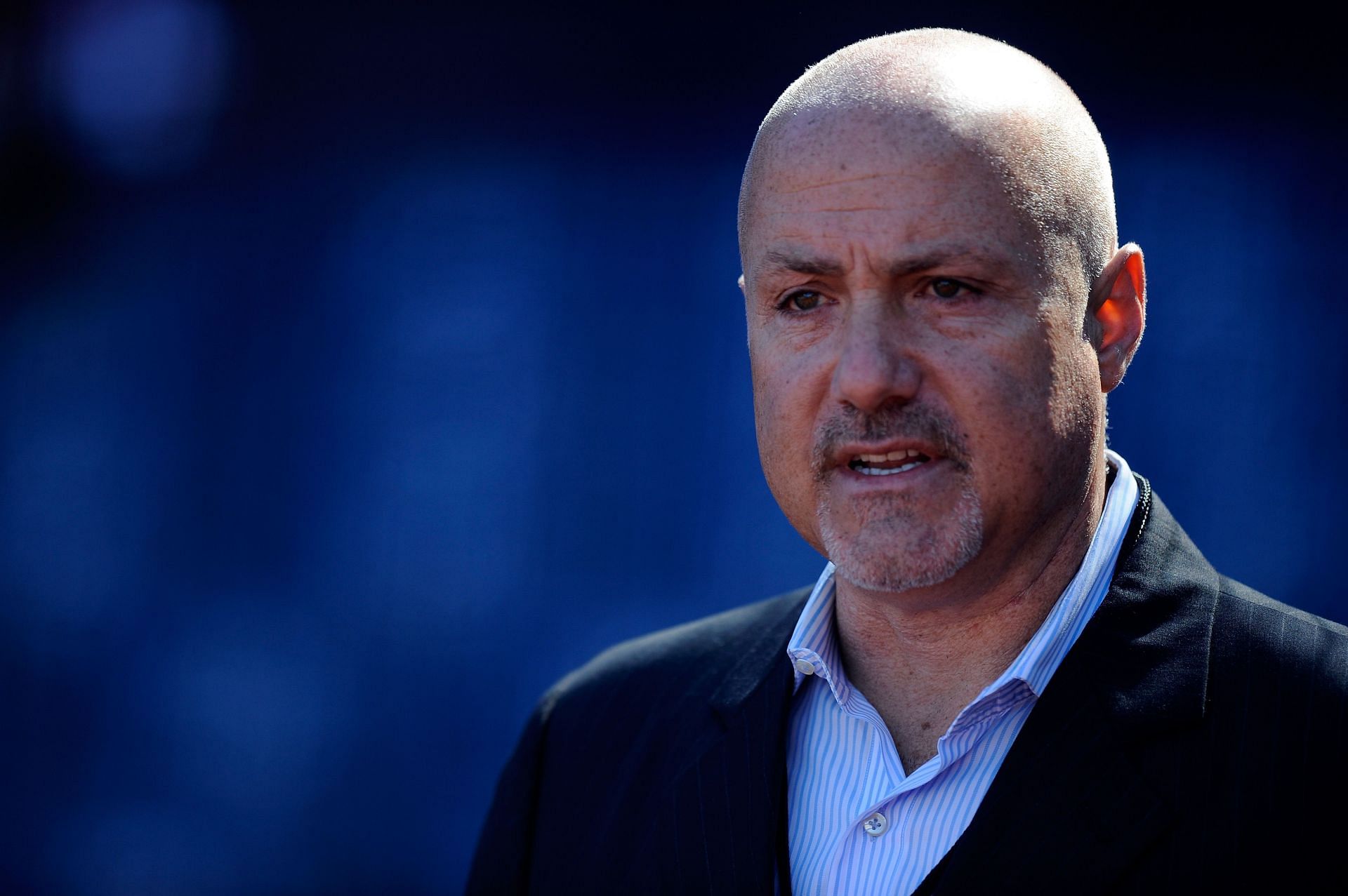 General manager Mike Rizzo of the Washington Nationals looks on during batting practice.