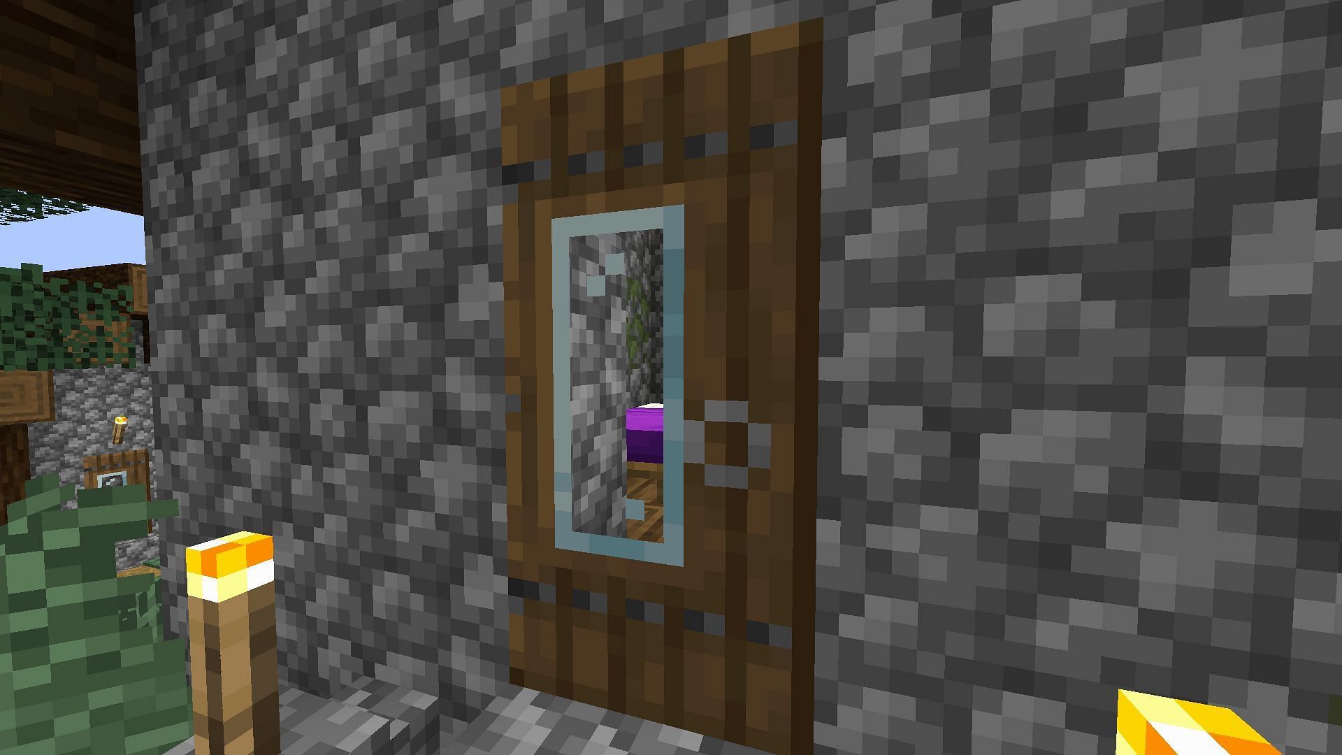 Glass panes on doors are a brilliant way to uniquely decorate structures in Minecraft (Image via Mojang)
