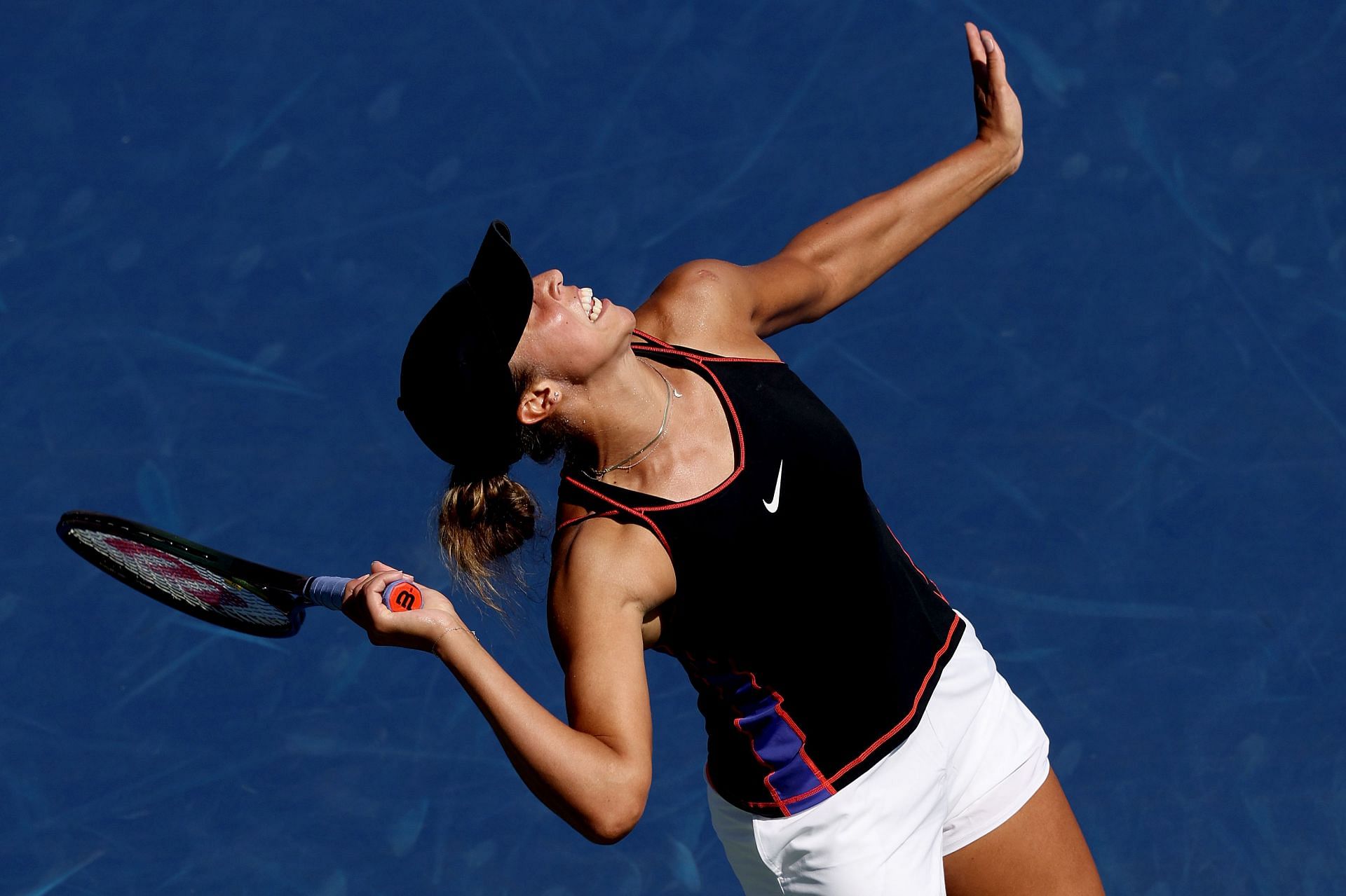 Madison Keys serves at the Western &amp; Southern Open