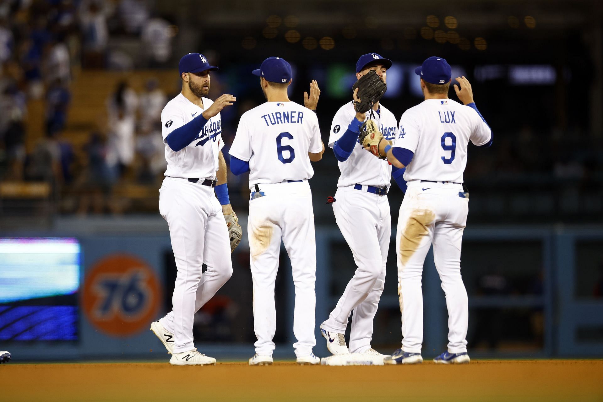 Joey Gallo and Trea Turner celebrate an 8-5 win against the Minnesota Twins at Dodger Stadium.