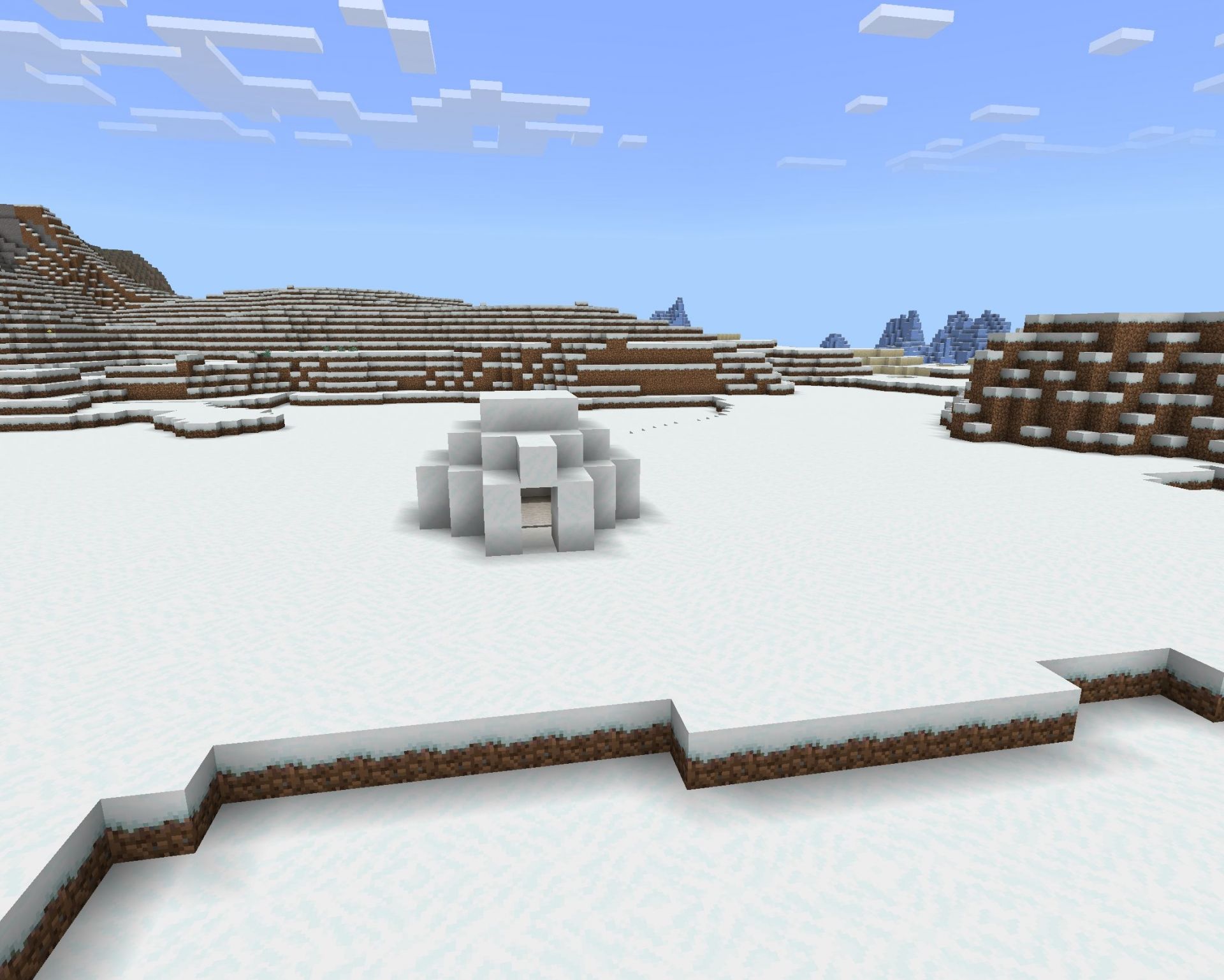 One of the many igloos with basements found near spawn (Image via Minecraft)