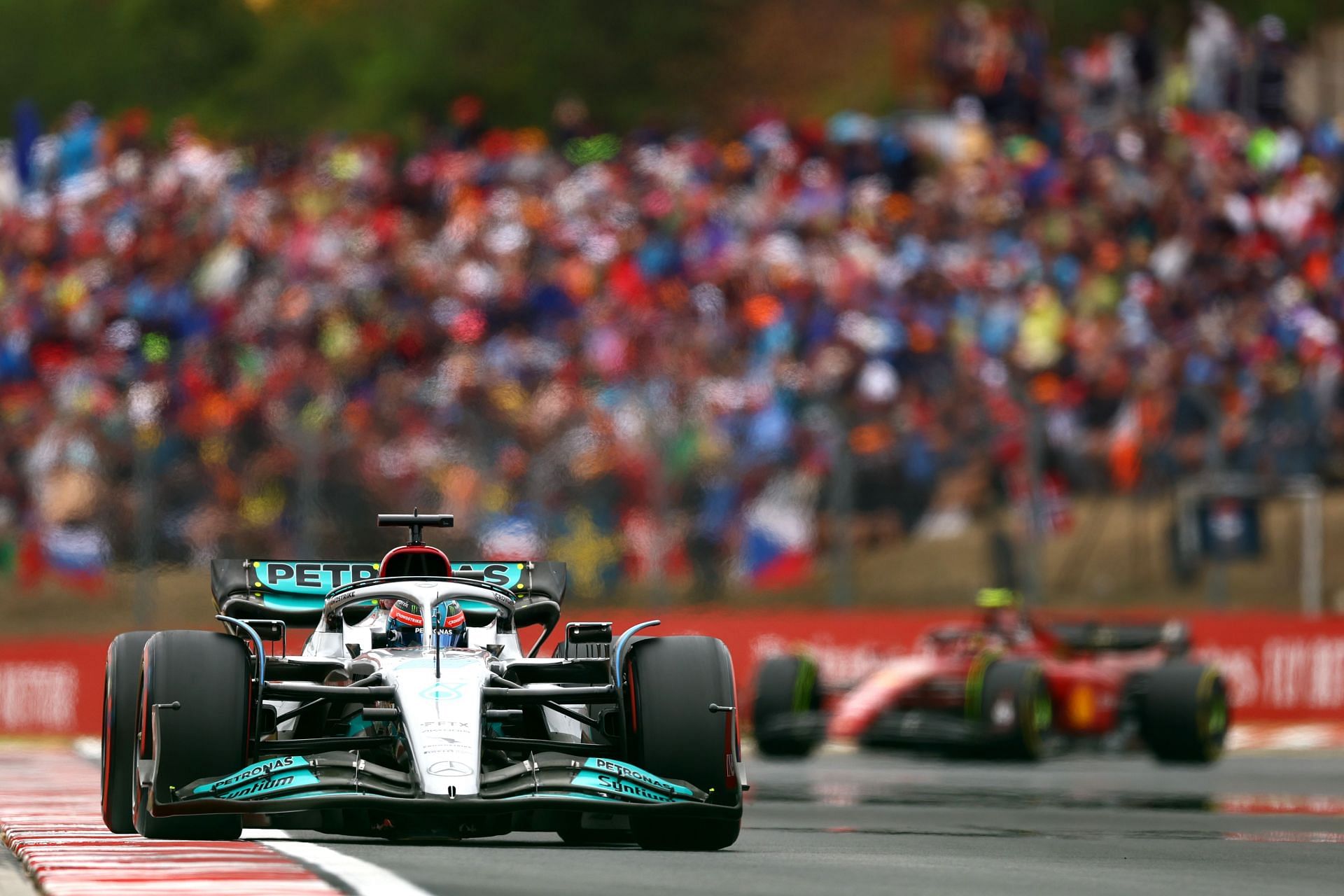 Mercedes&#039; George Russell leads Ferrari&#039;s Carlos Sainz during the F1 Grand Prix of Hungary at Hungaroring on July 31, 2022, in Budapest, Hungary (Photo by Francois Nel/Getty Images)