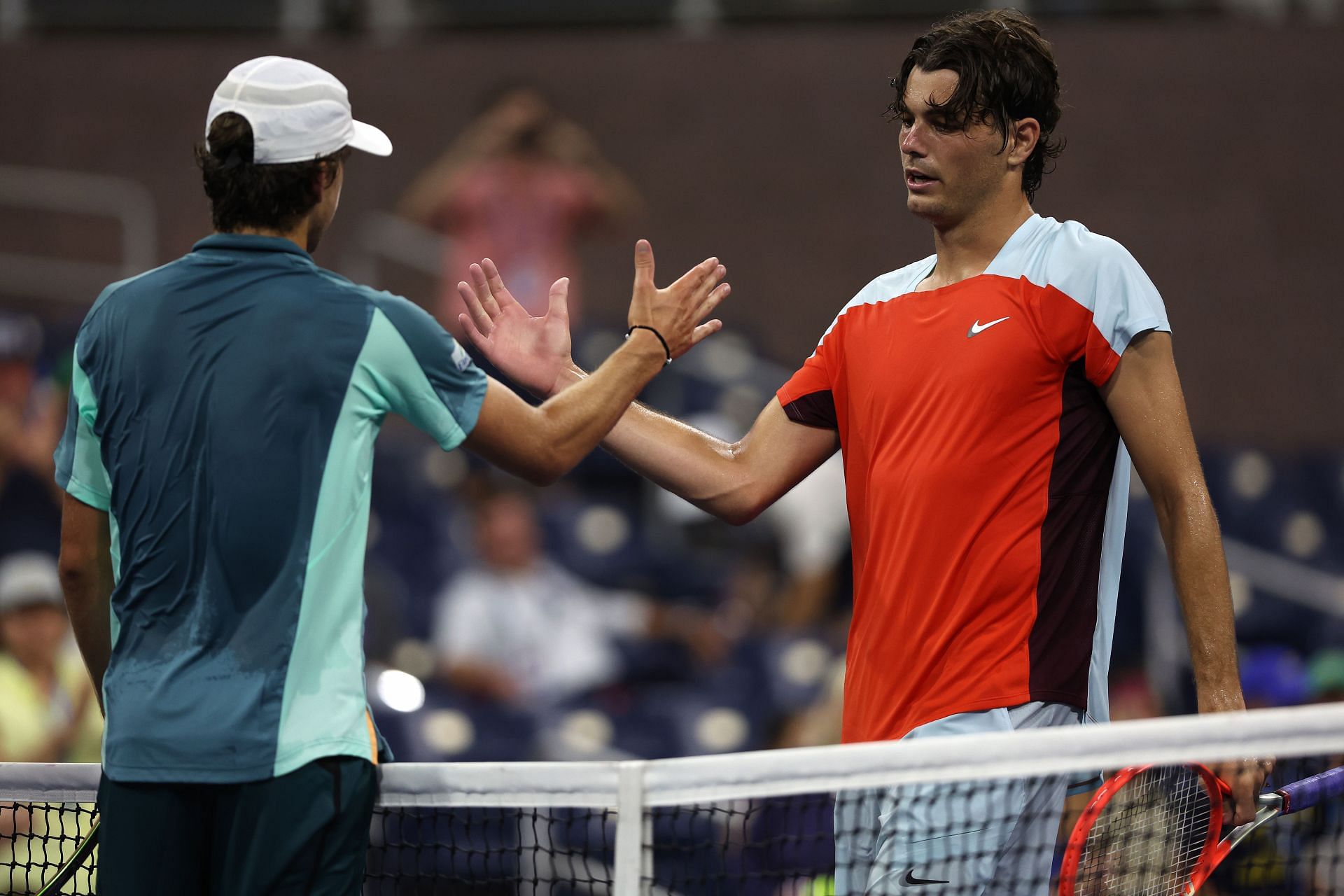 Taylor Fritz (right) bit the dust on the first day at Flushing Meadows.