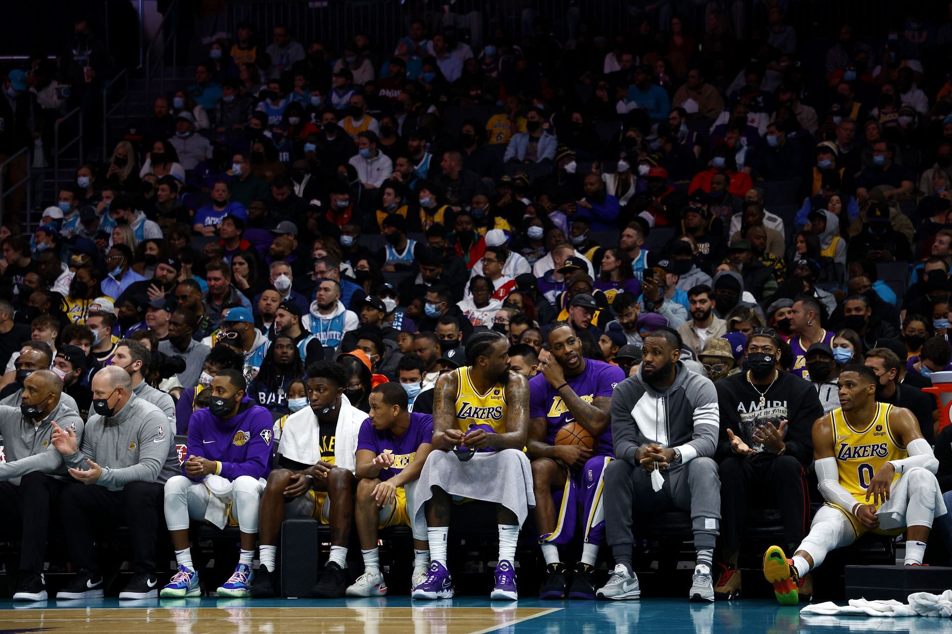LA Lakers bench looks on at a game