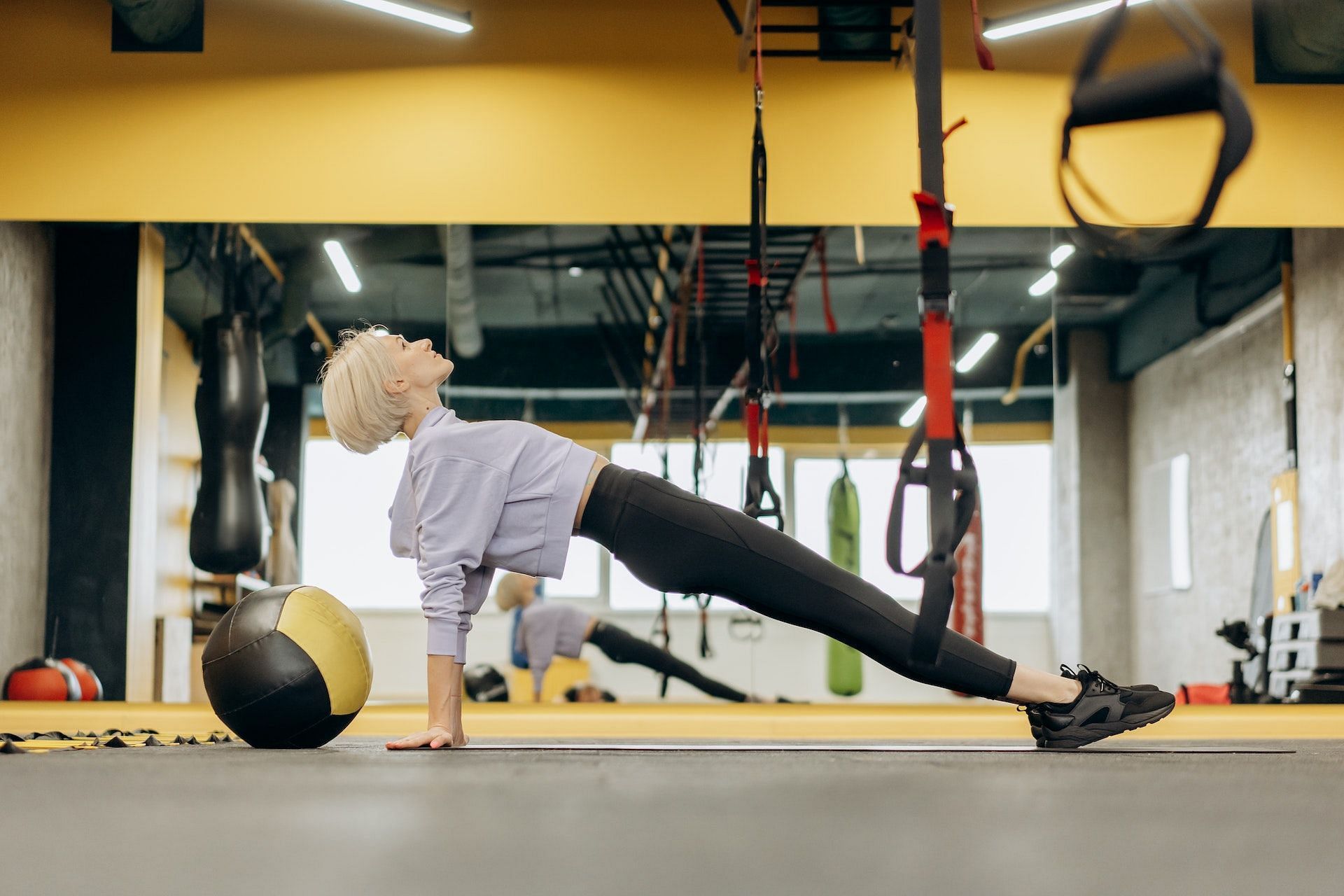 Slam ball exercises are effective and versatile workout. (Photo by Mikhail Nilov via pexels)