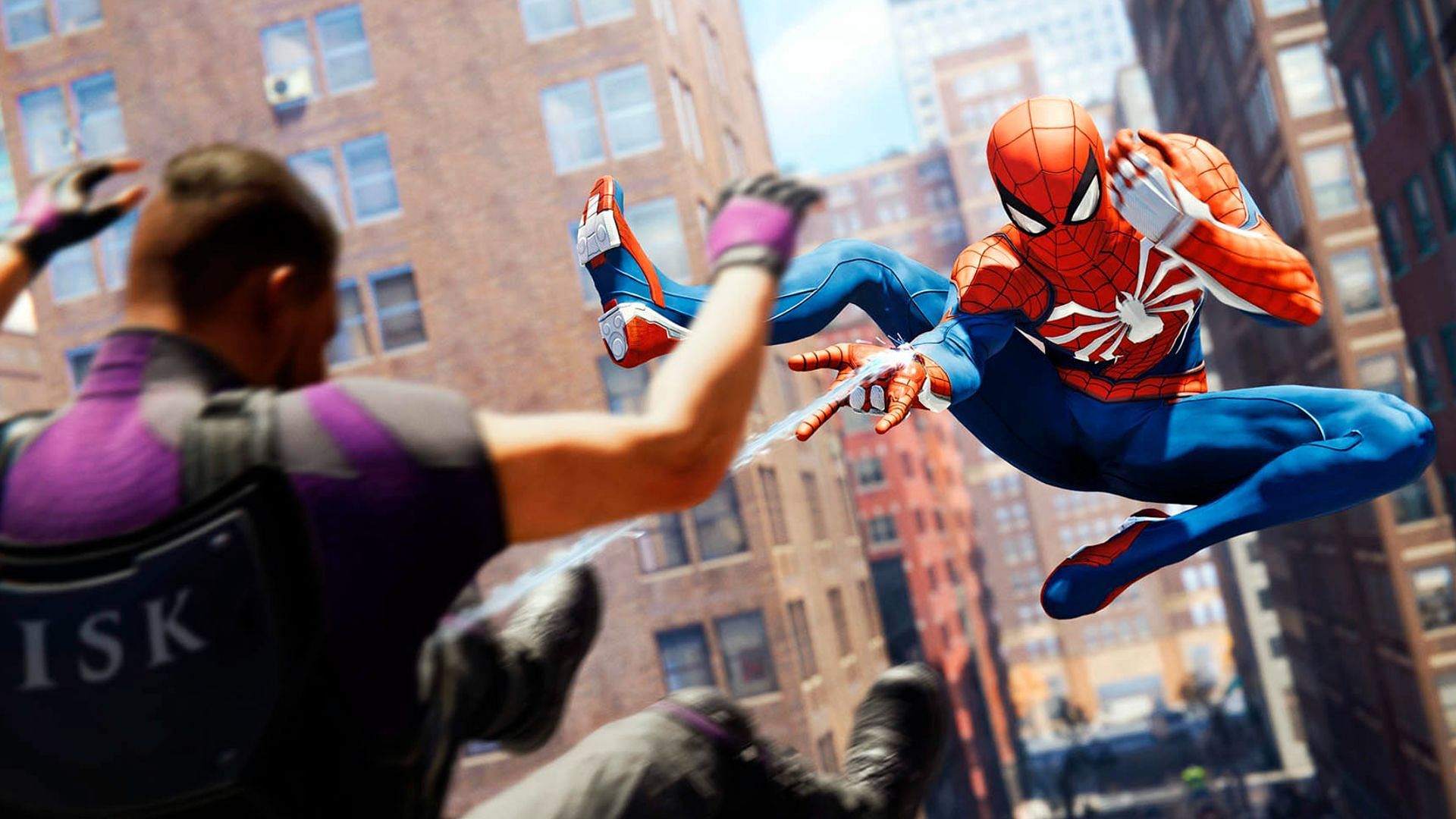 Spidey takes down a thug (Image via Insomniac Games)