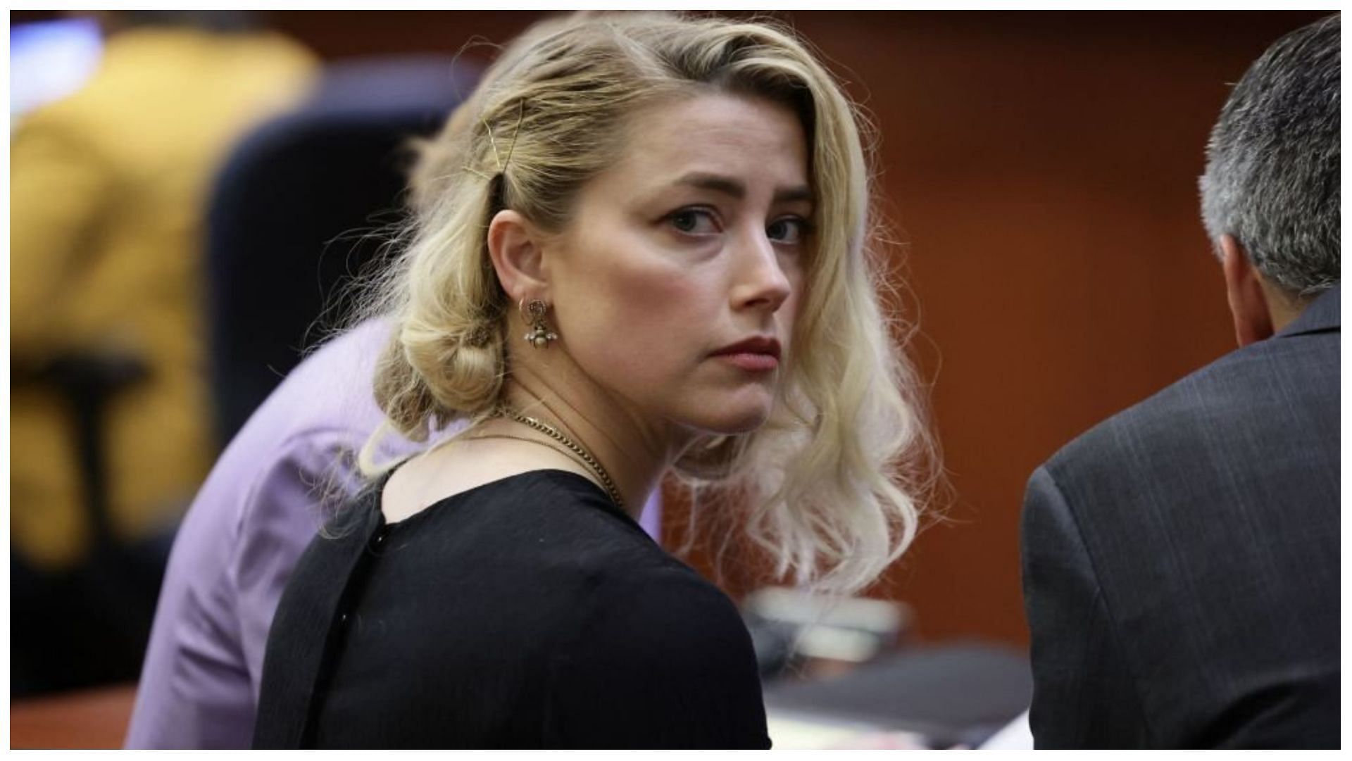 Amber Heard has hired a new legal team to represent her (Image via Evelyn Hockstein/Getty Images)