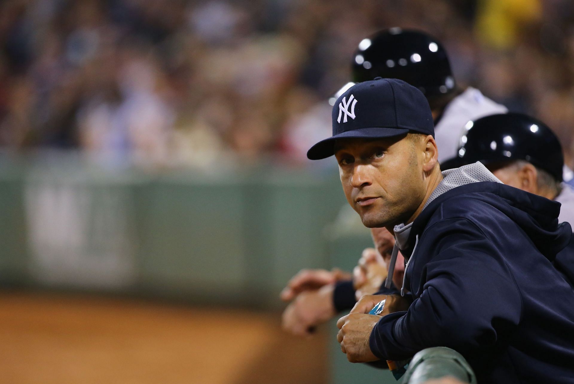 Derek Jeter of the New York Yankees looks on from the dugout during a game against the Boston Red Sox.