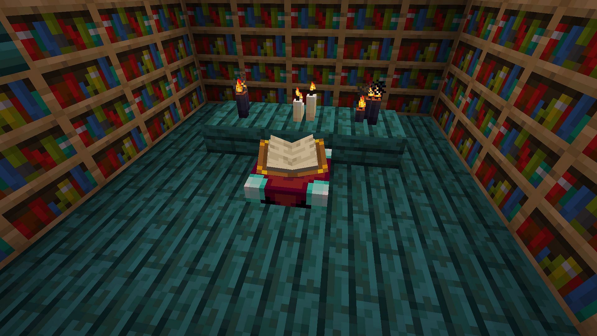 A basic enchanting setup decorated with candles (Image via Minecraft)