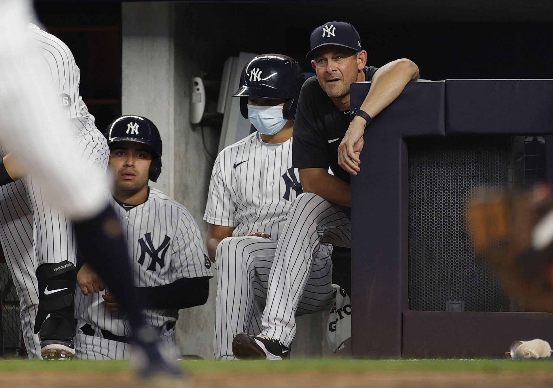 Manager Aaron Boone looks on from the dugout against the Los Angeles Angels at Yankee Stadium