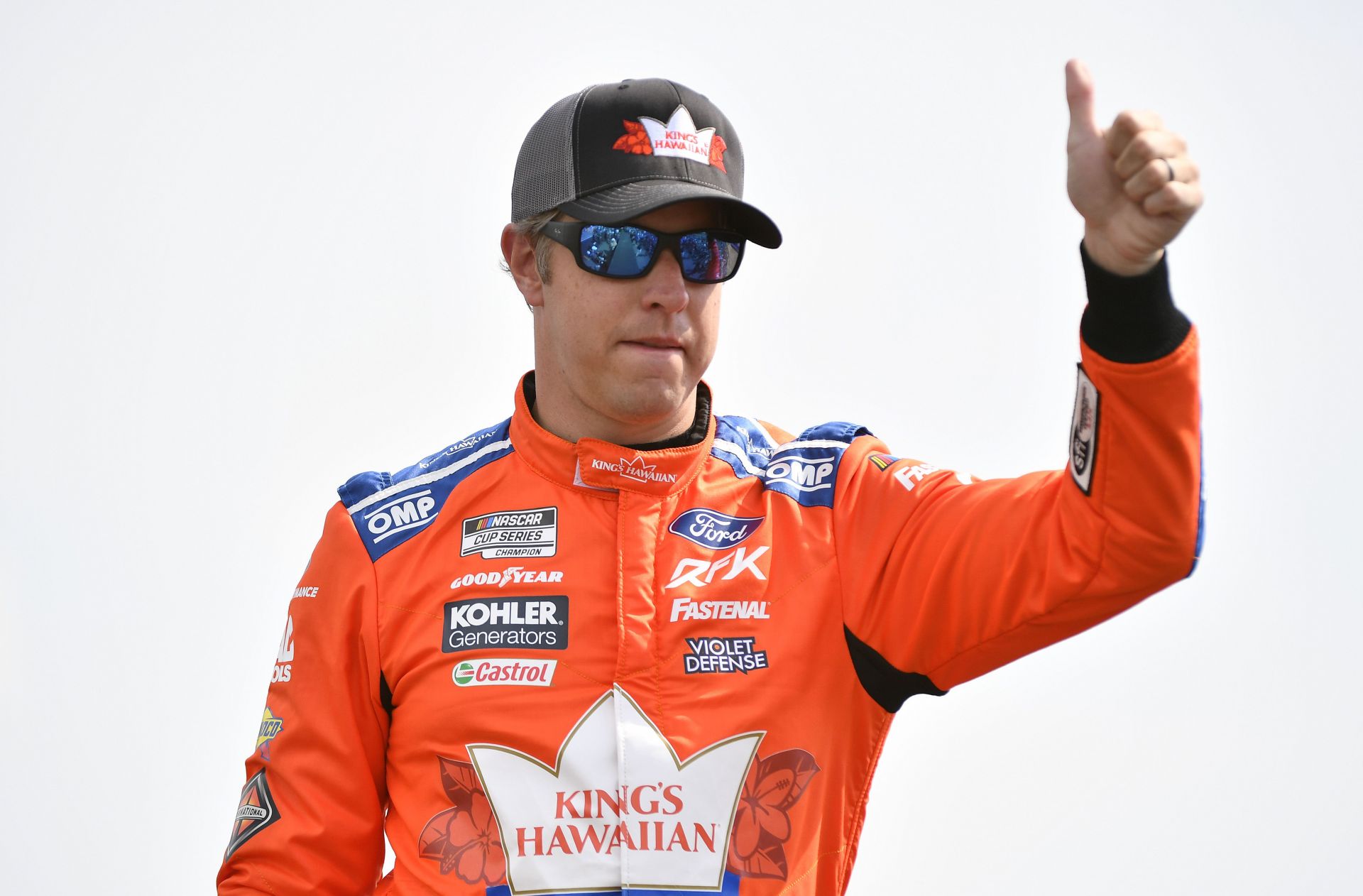 Brad Keselowski gives a thumbs up to fans onstage during driver intros before NASCAR Cup Series Ally 400 at Nashville Superspeedway