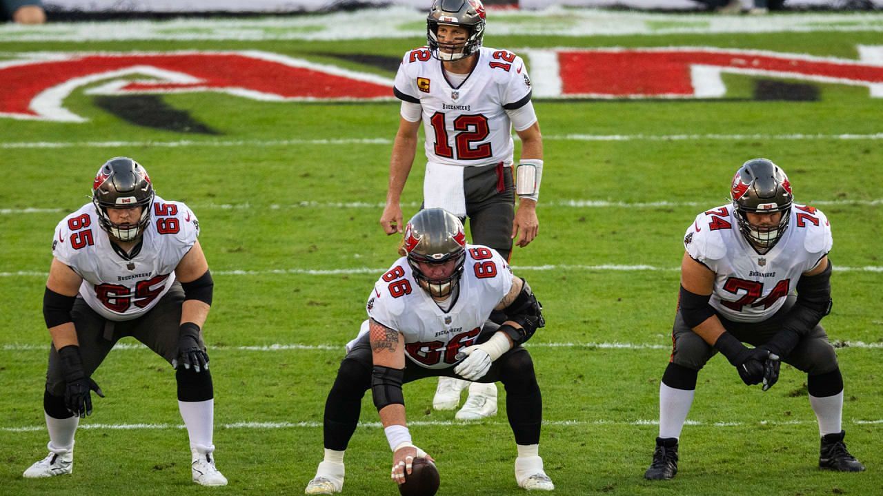Tampa Bay Buccaneers offensive line and quarterback Tom Brady