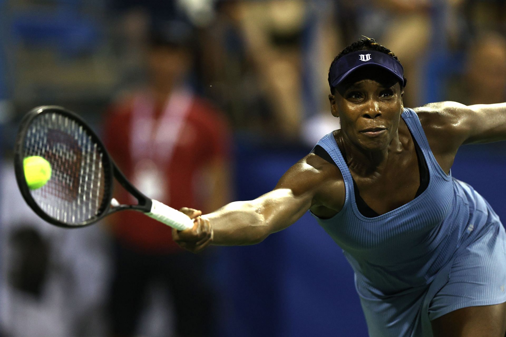Venus Williams reaches for the ball in her match against Rebecca Marino at the Citi Open