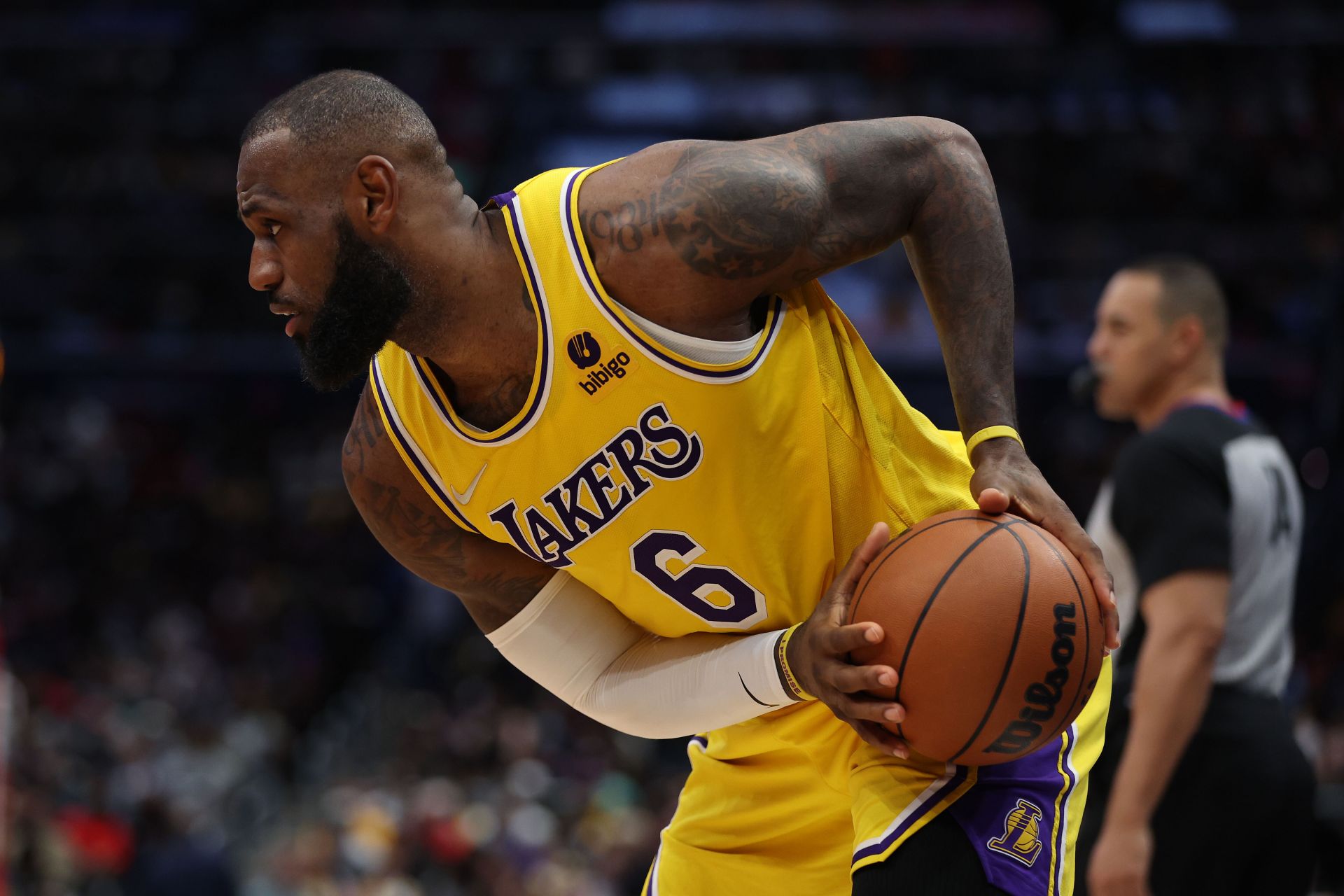 LeBron James faces up against a defender