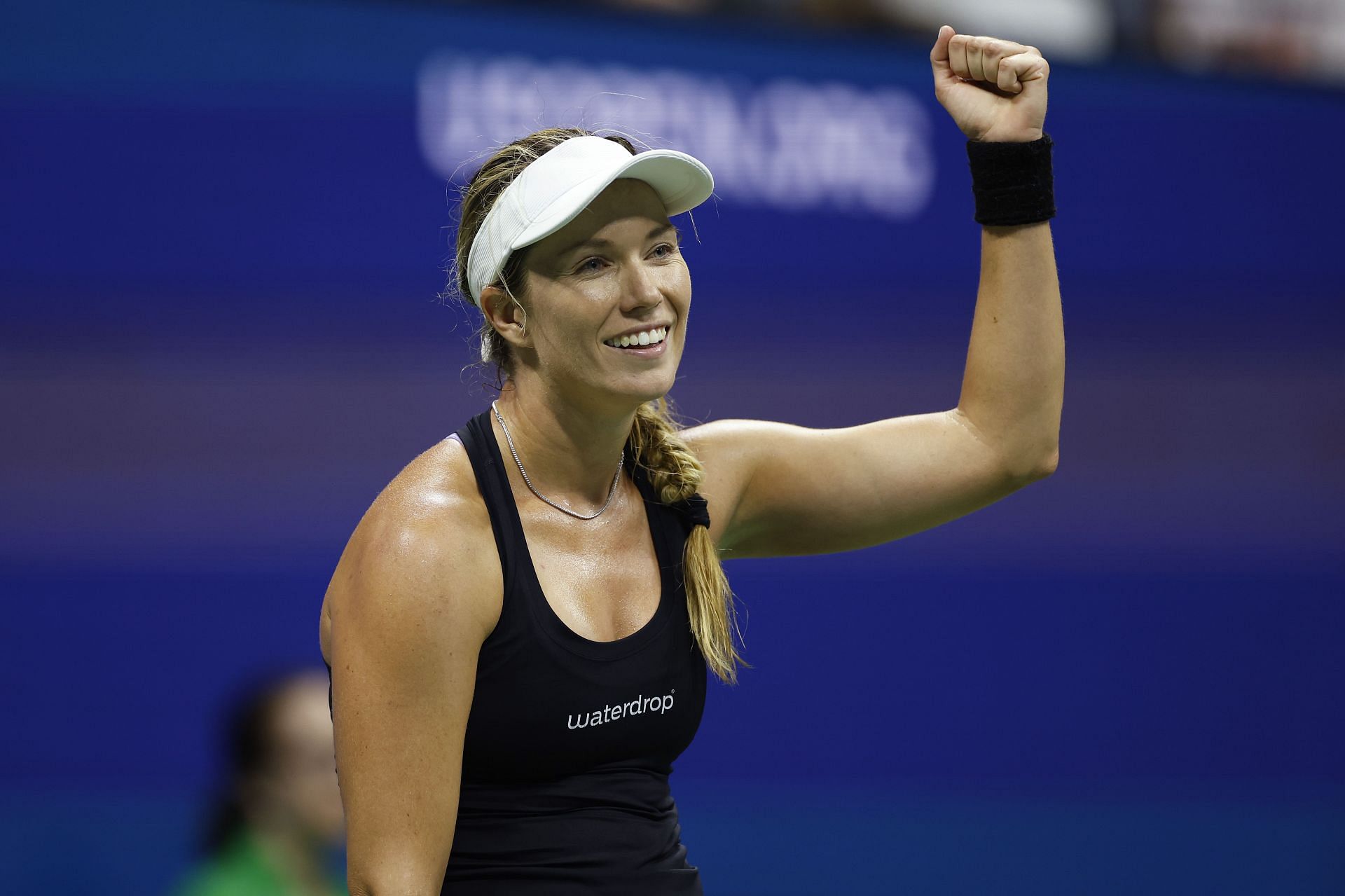 Danielle Collins celebrates after defeating Naomi Osaka at the 2022 US Open 