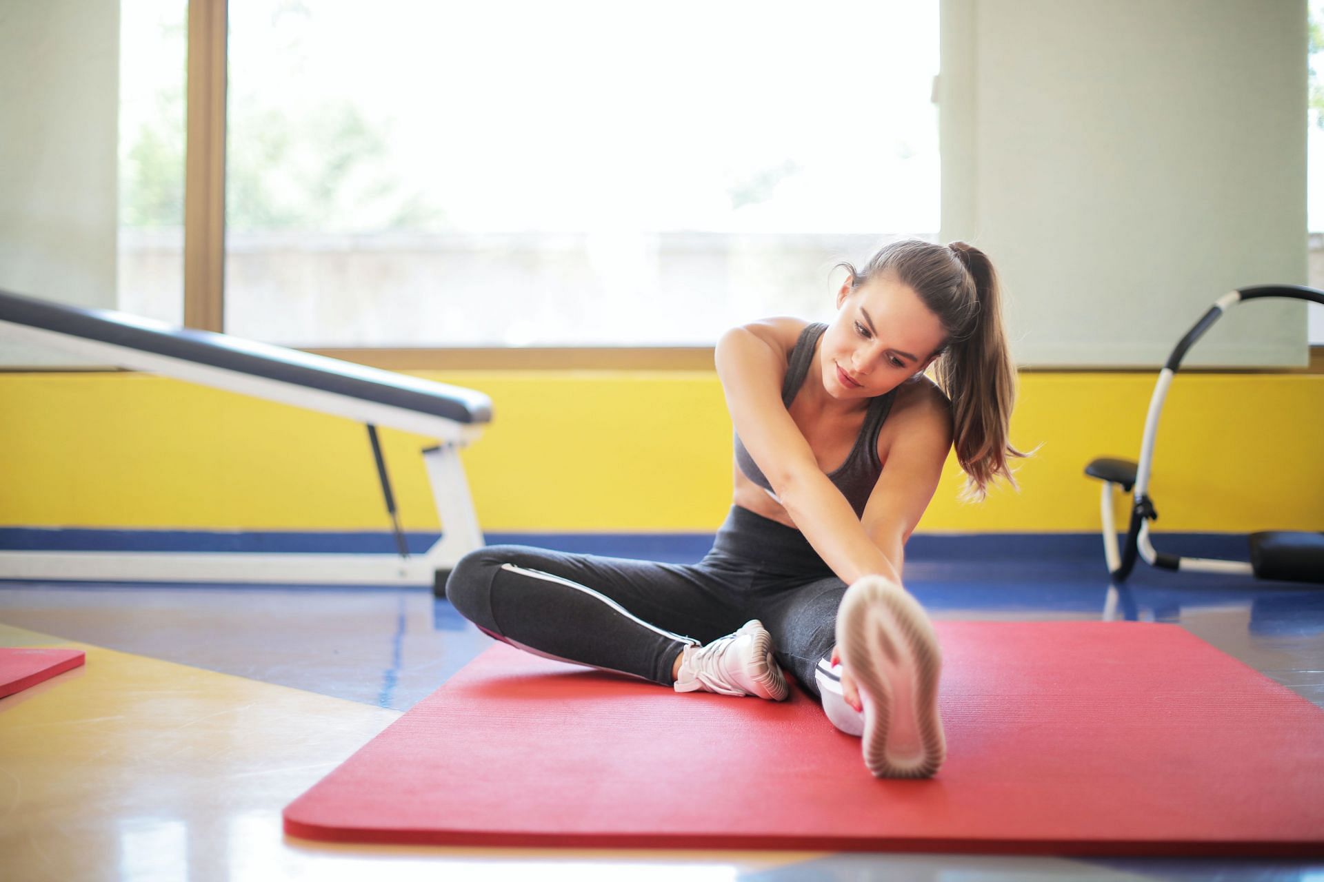 Best yoga exercises to reduce belly fat. (Image via Pexels/Andrea Piacquadio)