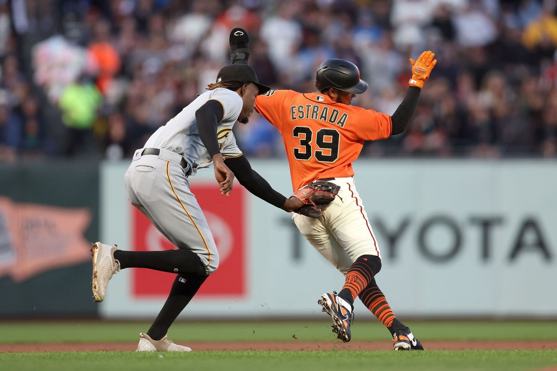 Oneil Cruz of the Pirates and Thairo Estrada of the Giants