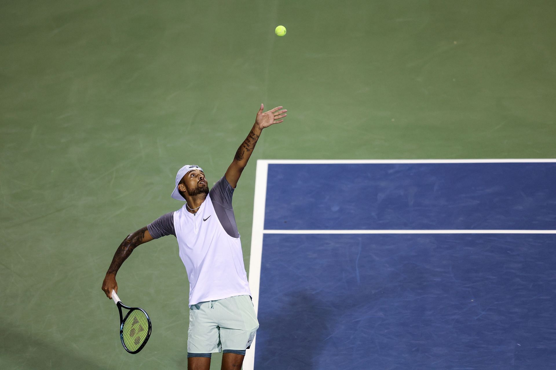 Nick Kyrgios serves during the 2022 Citi Open