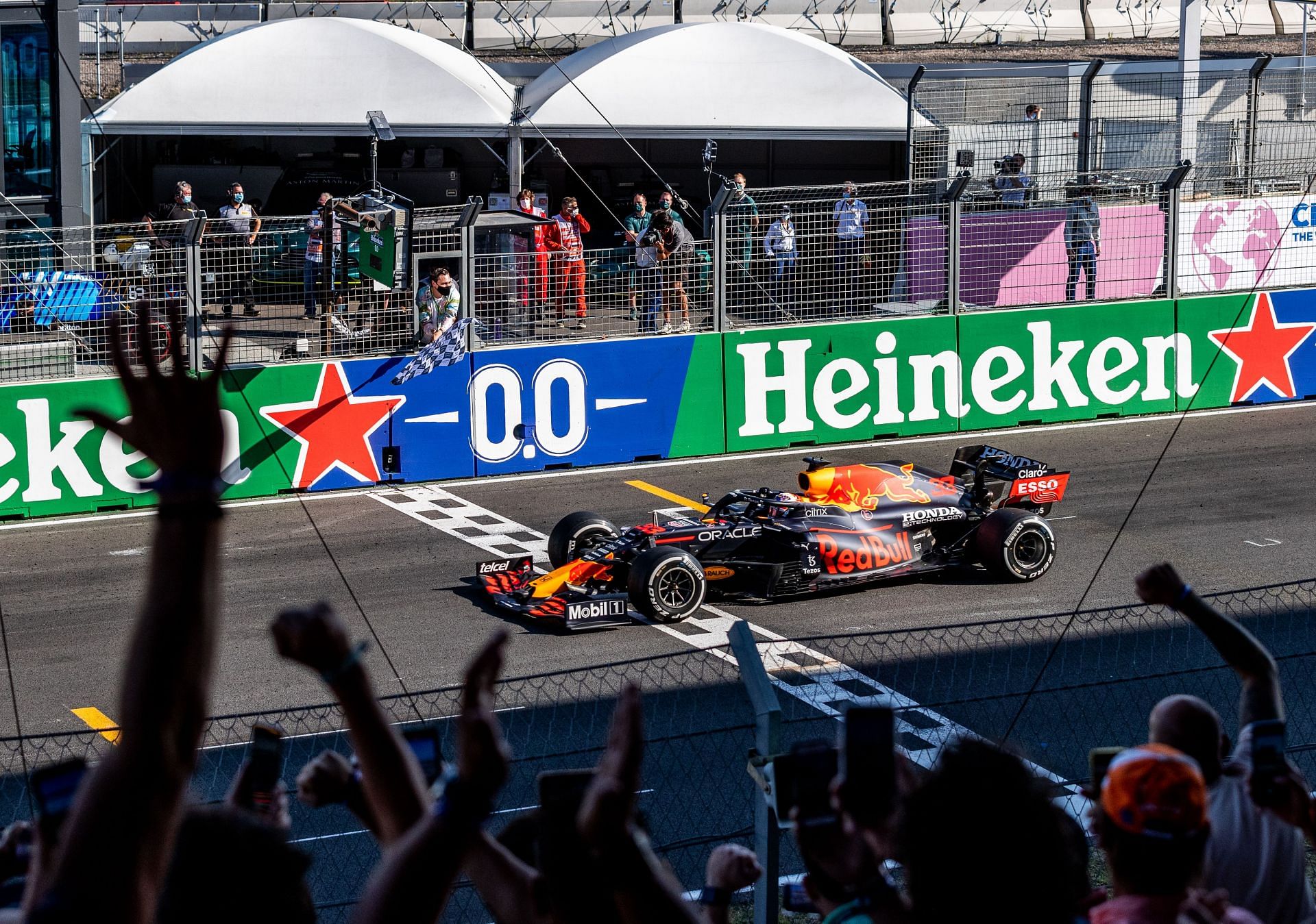 Fans watch on as Red Bull driver Max Verstappen wins the 2021 F1 Dutch GP at the Circuit Zandvoort (Photo by Boris Streubel/Getty Images)