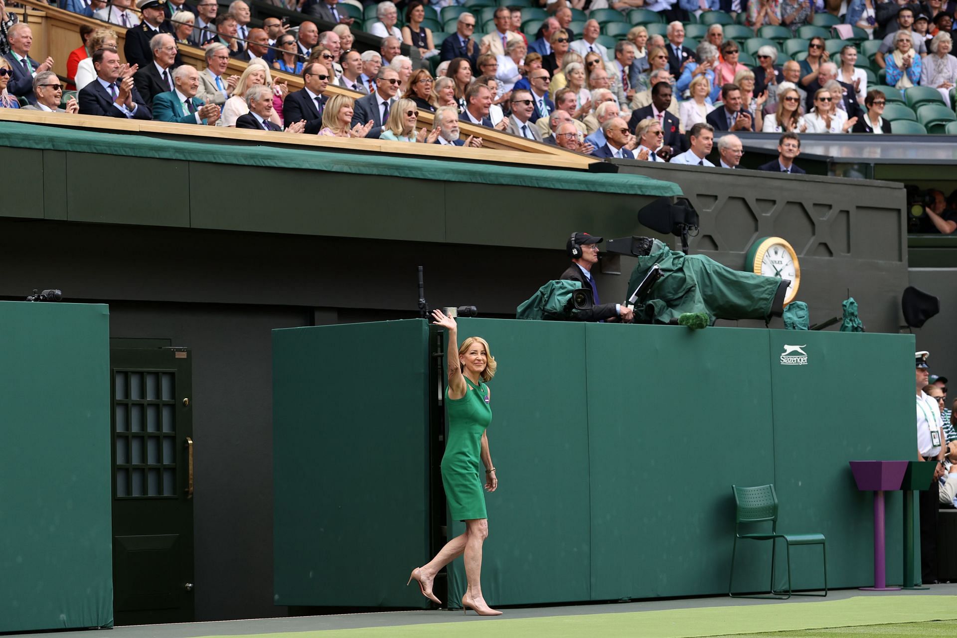 Chris Evert acknowledges spectators at the Centre Court centenary celebration on Day 7 of the Wimbledon Championships 