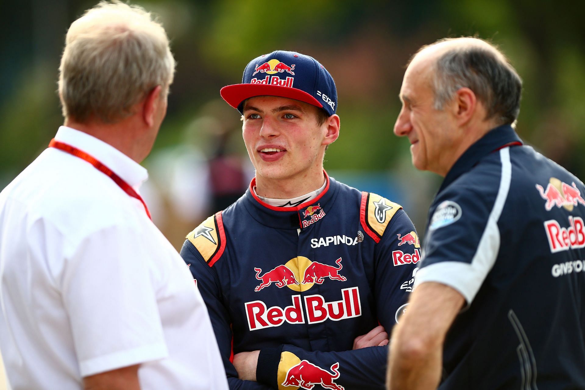 Max Verstappen talks to Red Bull Racing team consultant Dr. Helmut Marko (left) and Scuderia Toro Rosso team principal Franz Tost (right) during the Formula One Grand Prix of China at Shanghai International Circuit on April 17, 2016, in Shanghai, China (Photo by Dan Istitene/Getty Images)