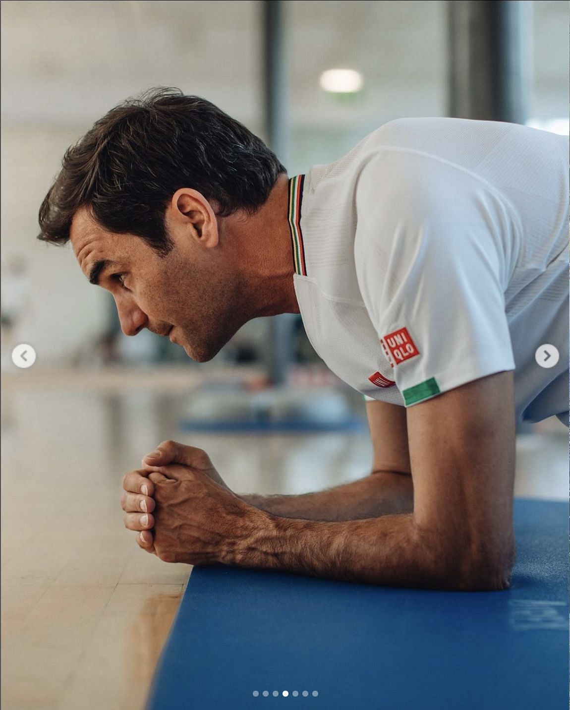 Federer likely doing planks at the gym.
