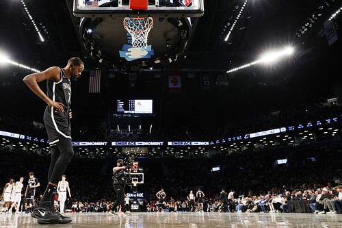 Kevin Durant looks on at the game