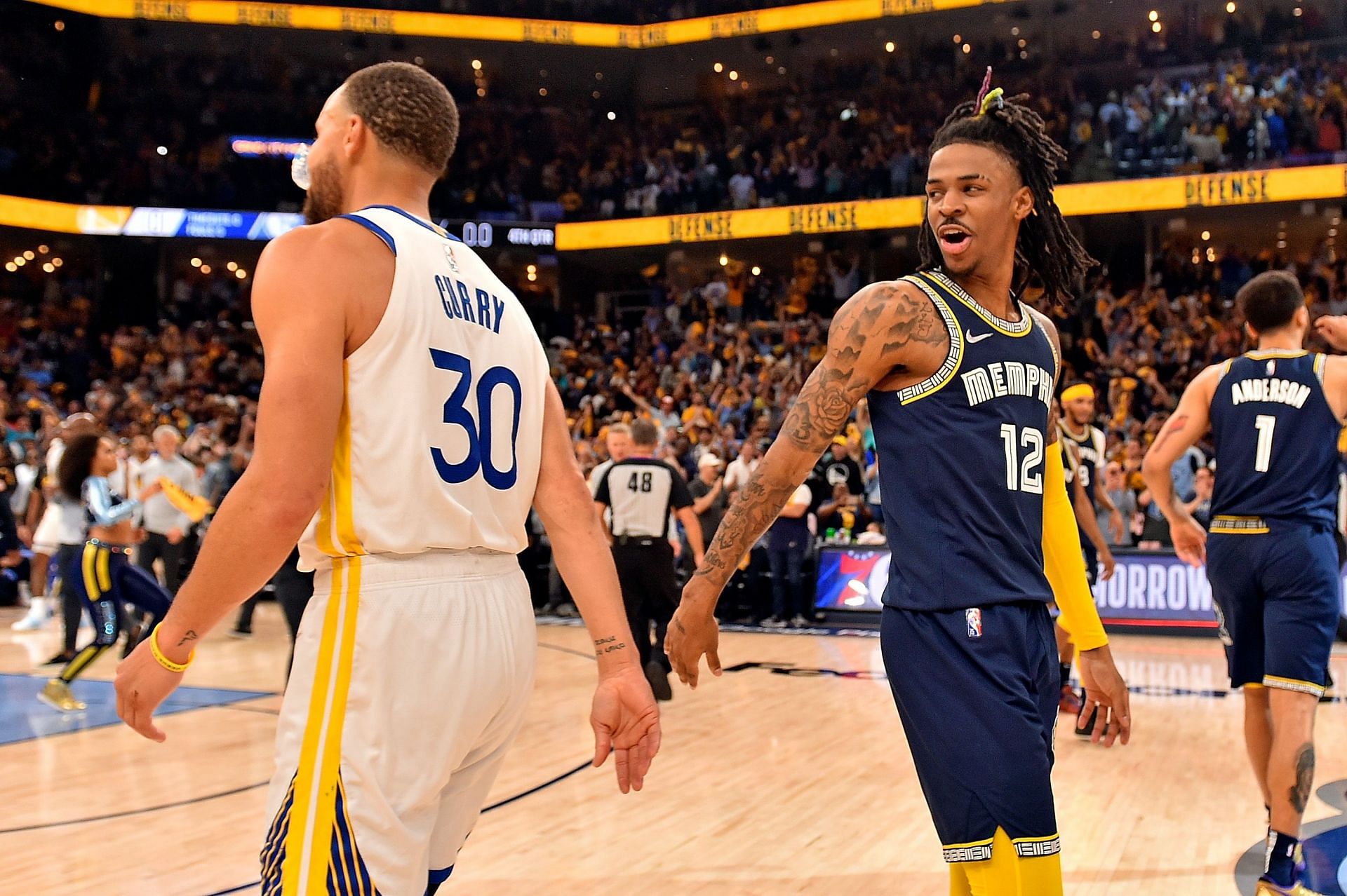 Steph Curry and Ja Morant interact after an NBA playoff game